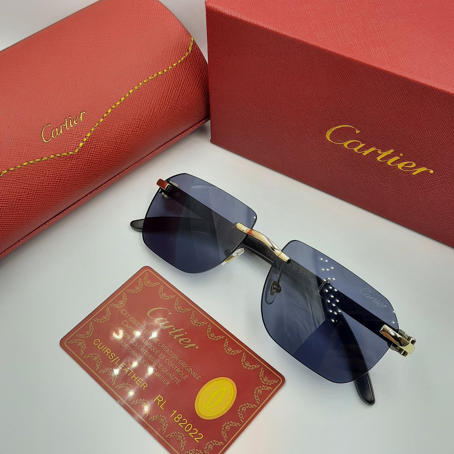 CARTIER rimless doré noir