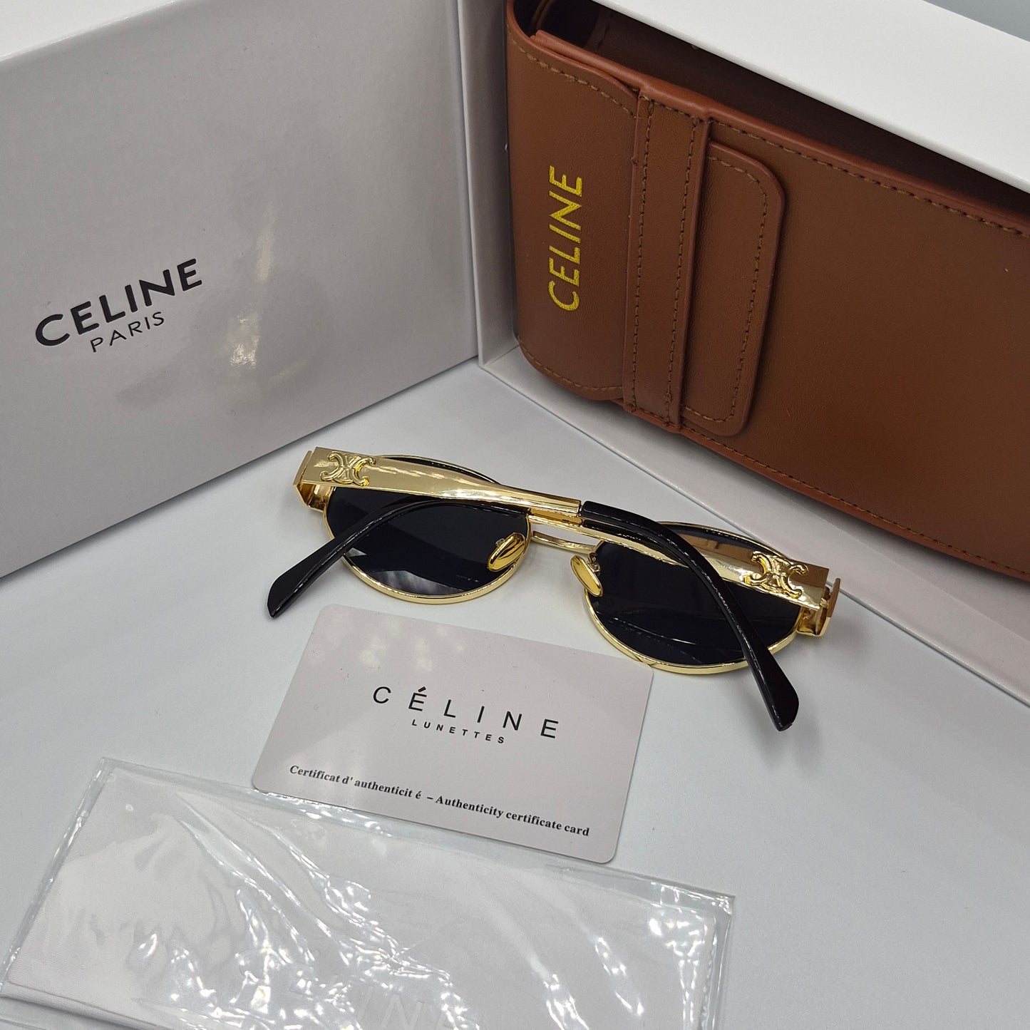 CELINE triomphe doré noir