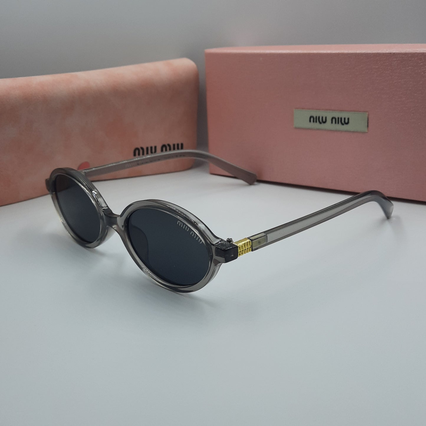 MIU MIU gris doré