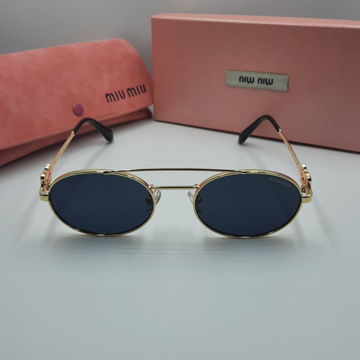 MIU MIU doré noir