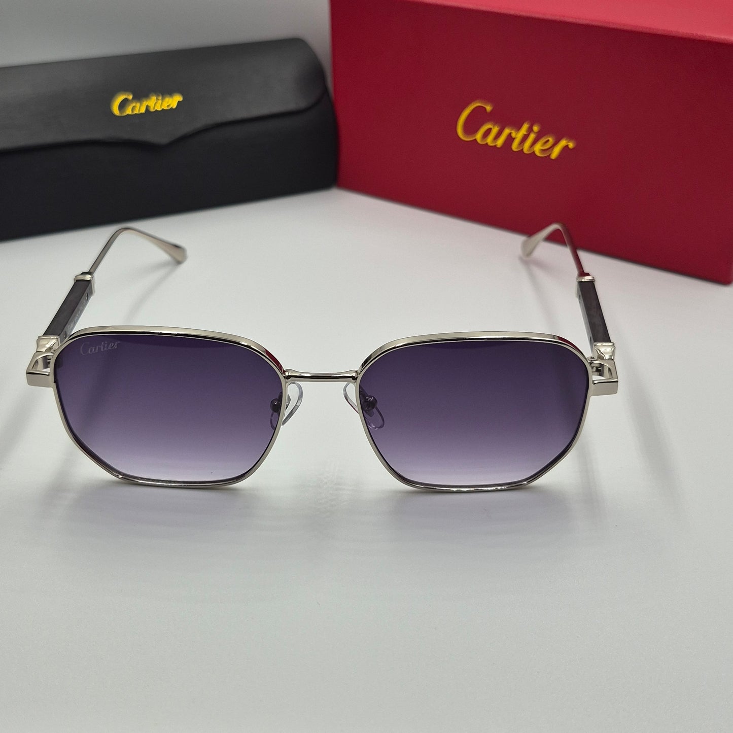 CARTIER luxe metal bois noir argent