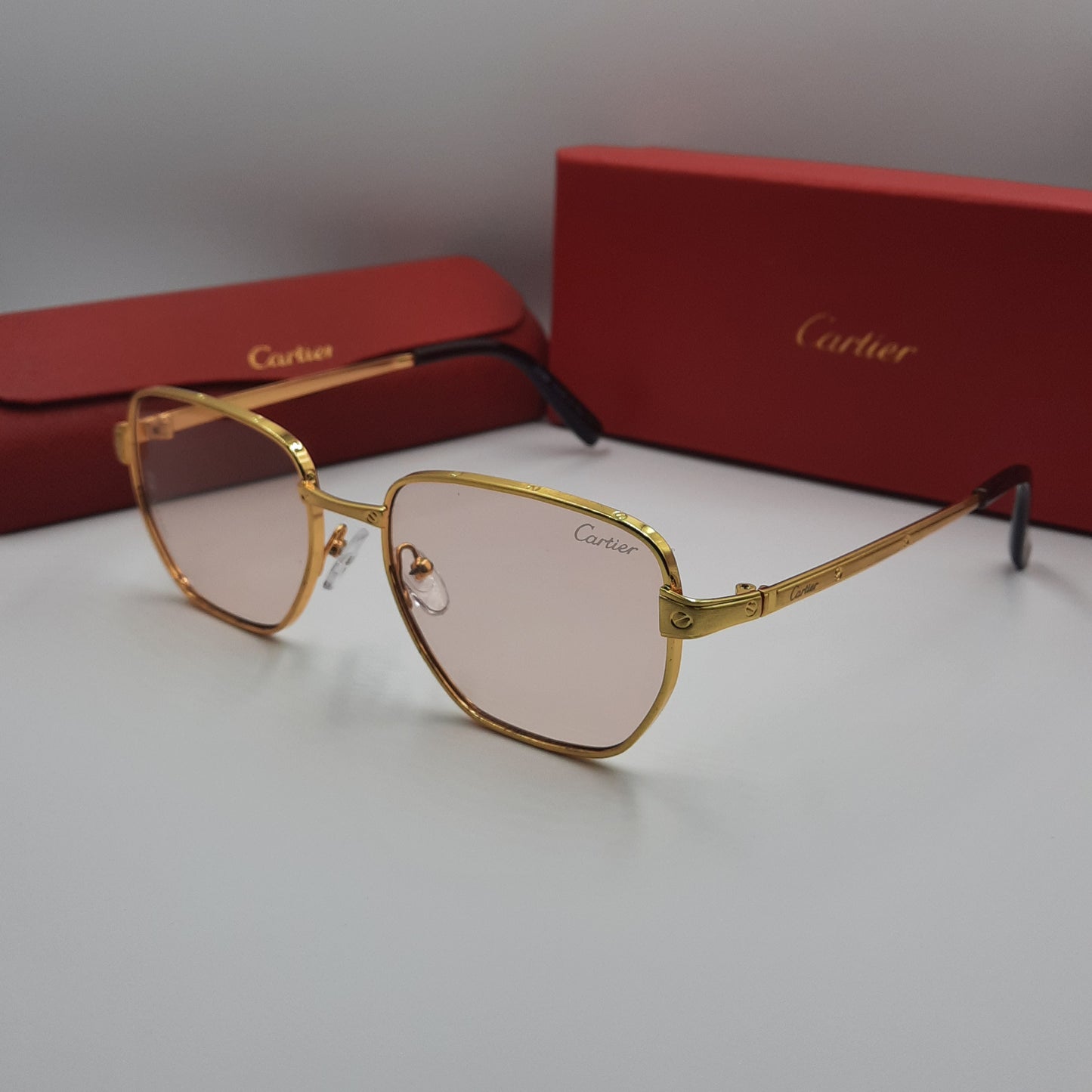 CARTIER doré metal saumon clair