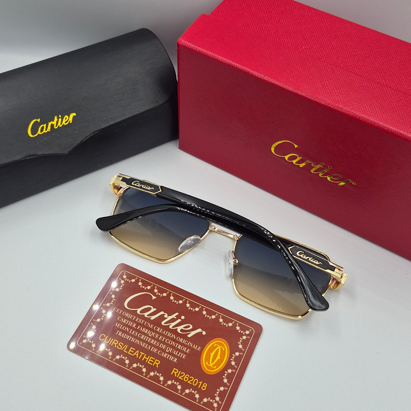 CARTIER noir doré bleu sunrise