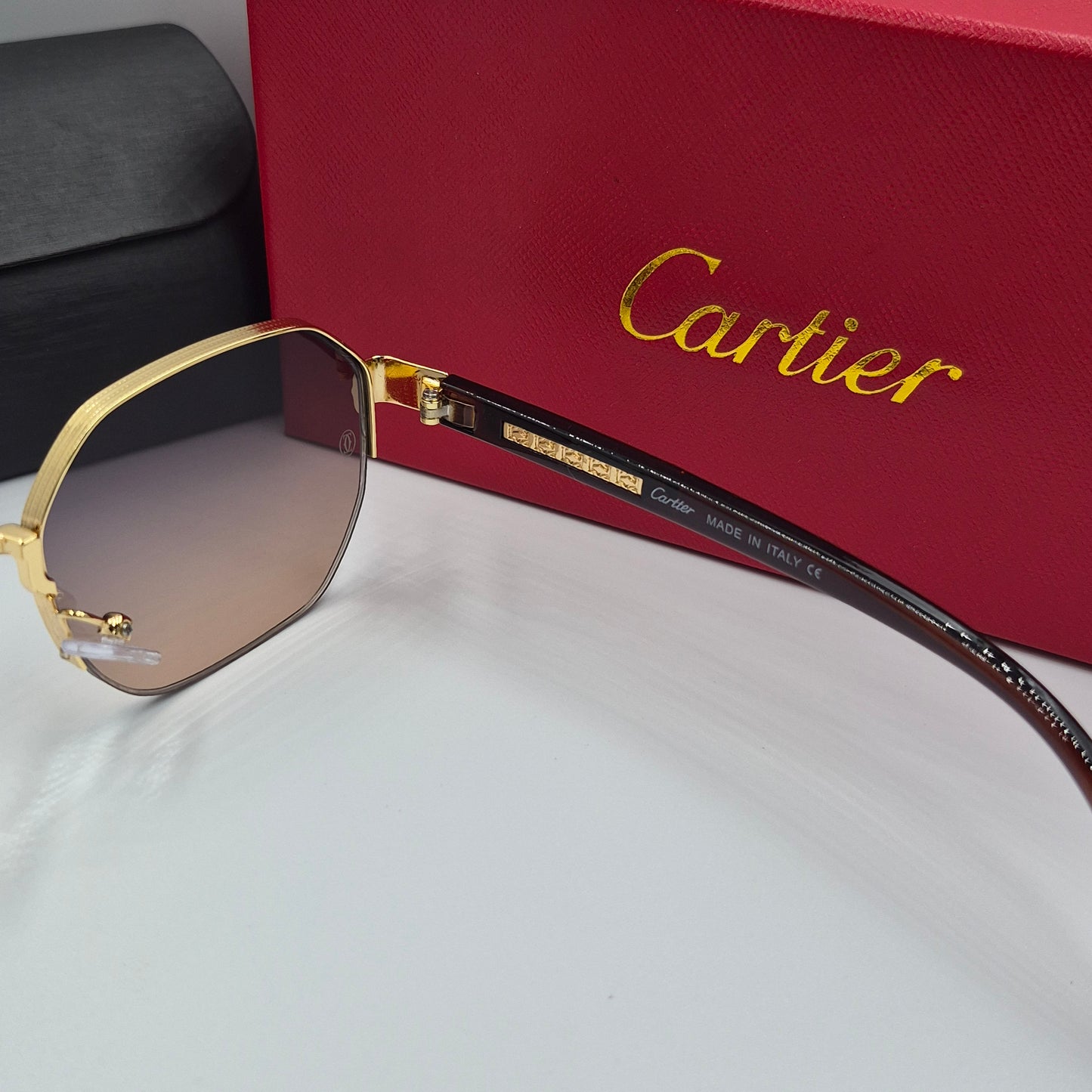 CARTIER semi percée doré marron