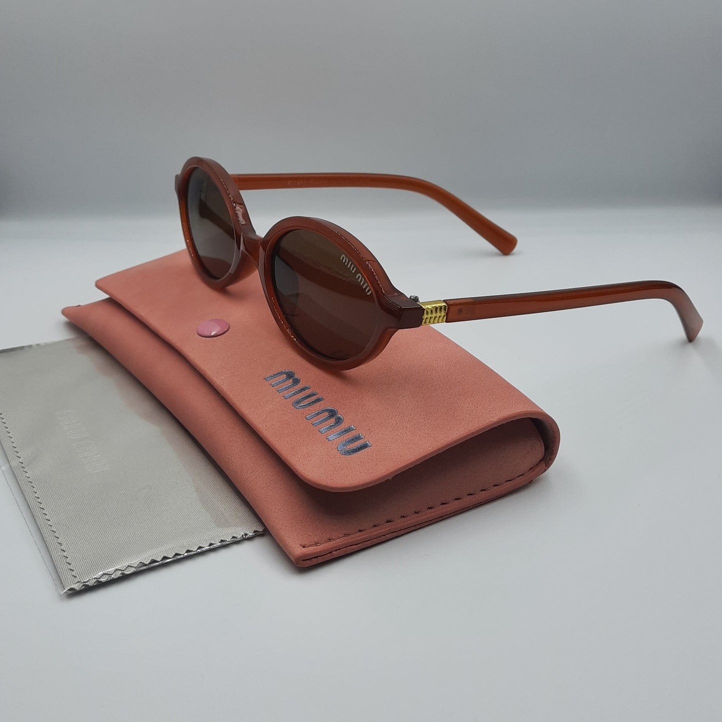 MIU MIU burgundy doré