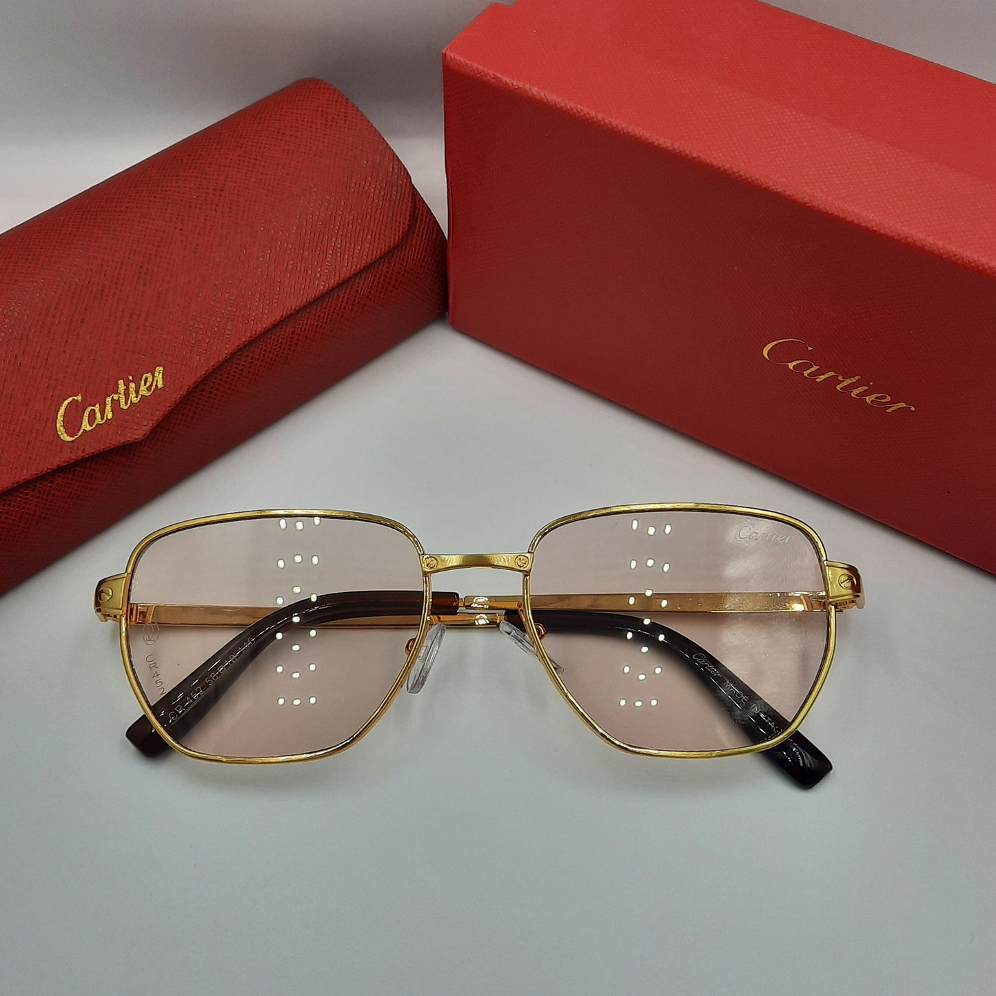 CARTIER doré metal saumon clair