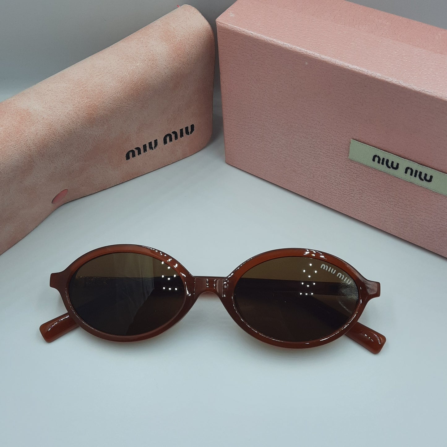 MIU MIU burgundy doré