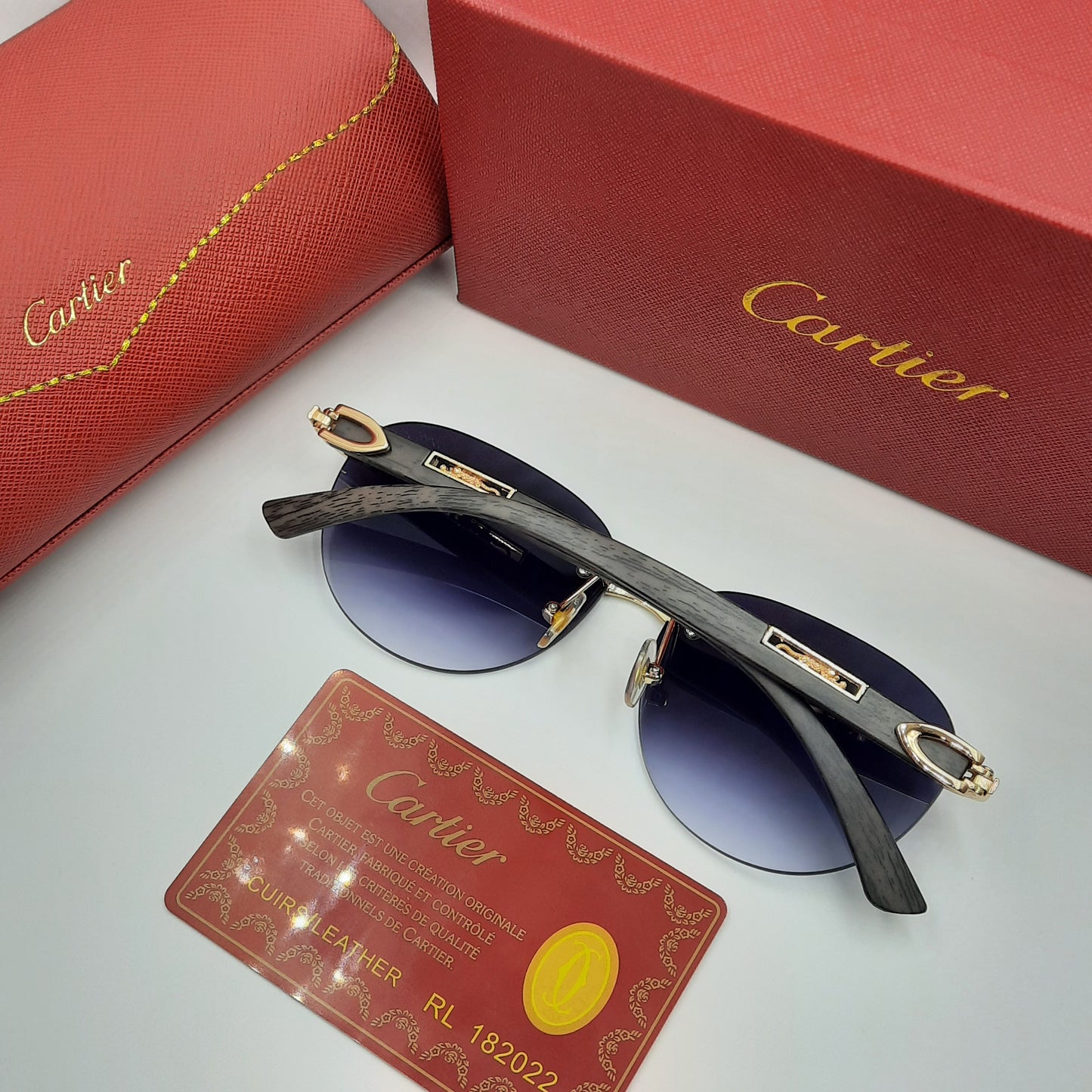 CARTIER percée doré noir wood