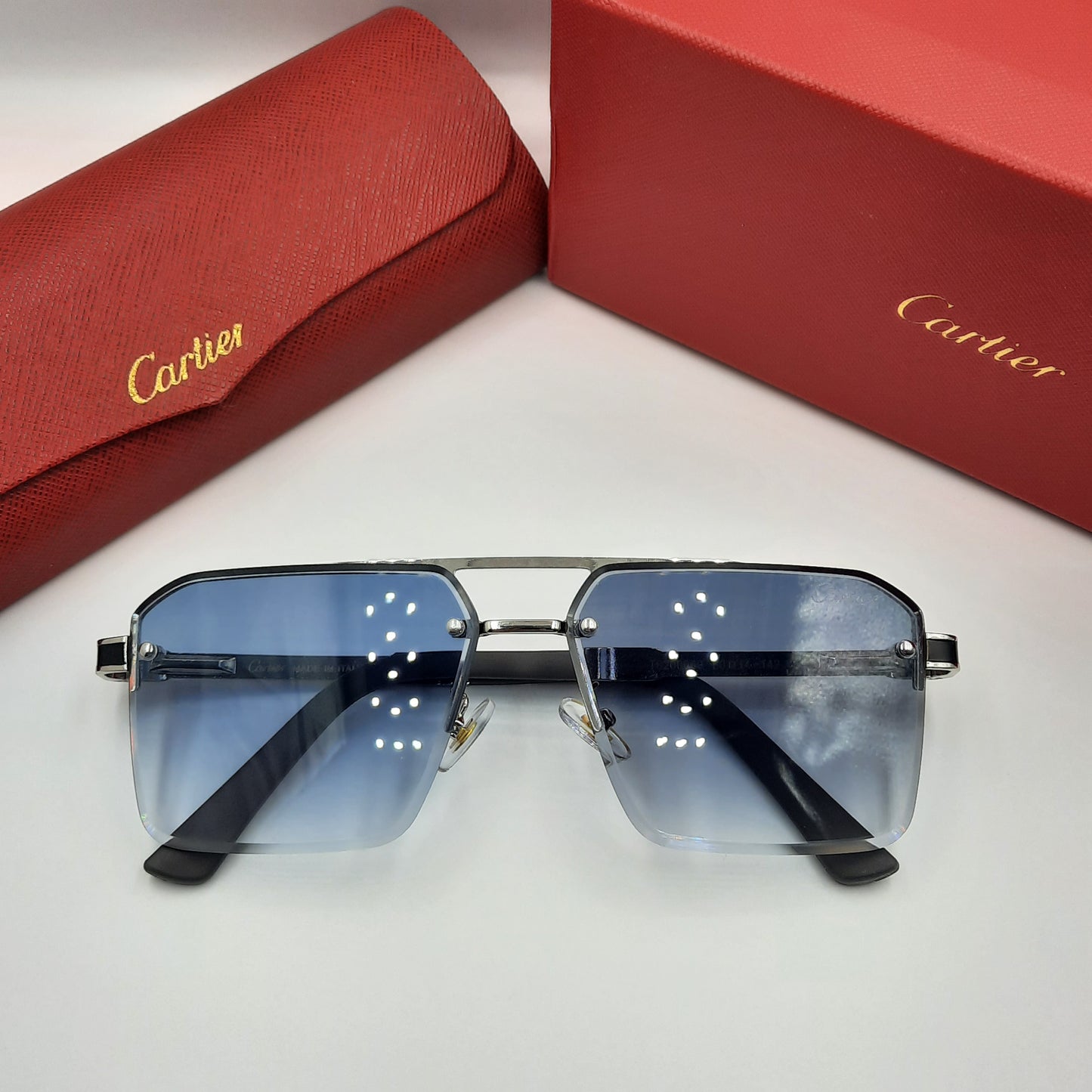 CARTIER bleu ciel argent