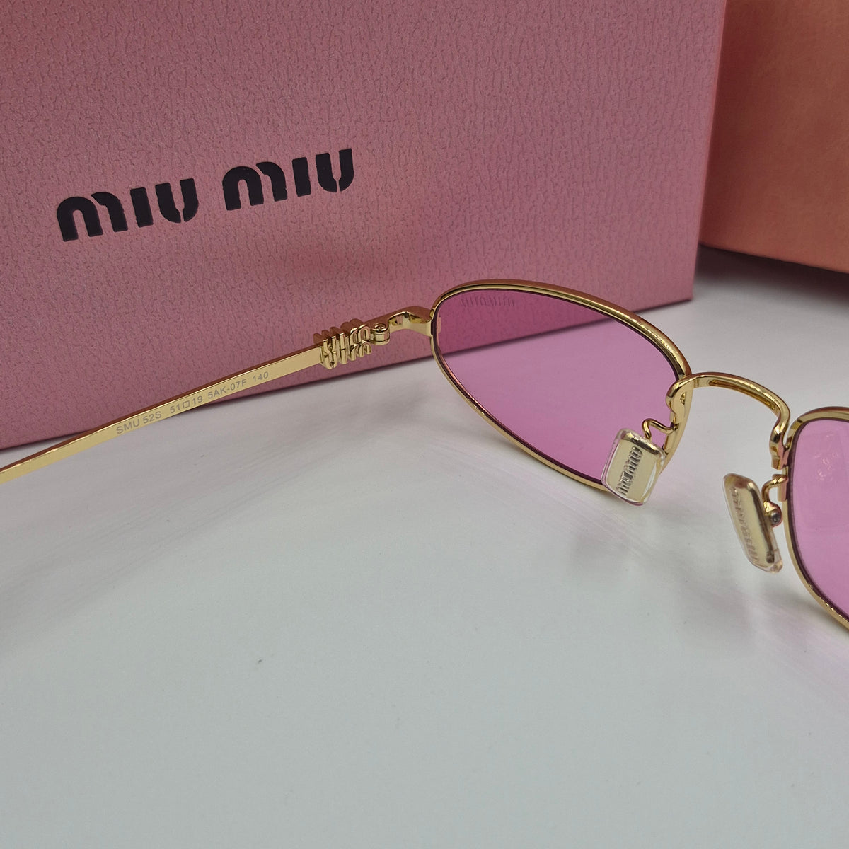 MIU MIU rose gold