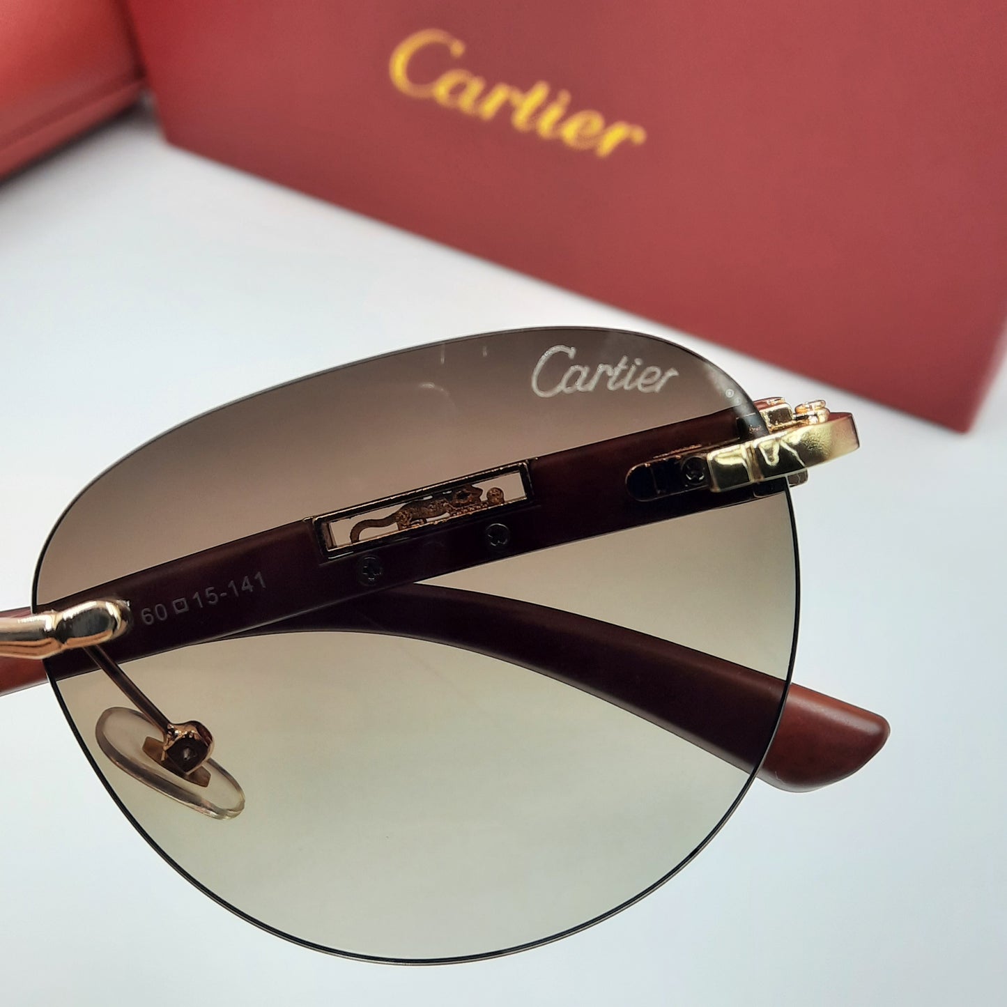CARTIER percée doré marron