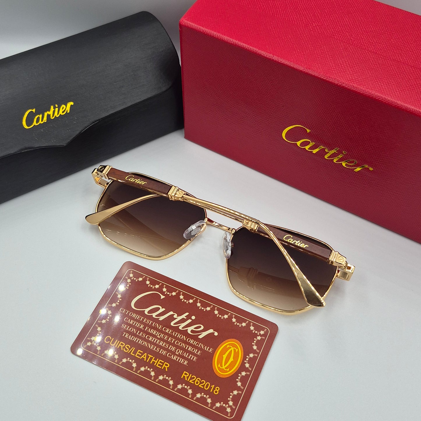 CARTIER luxe metal bois doré marron