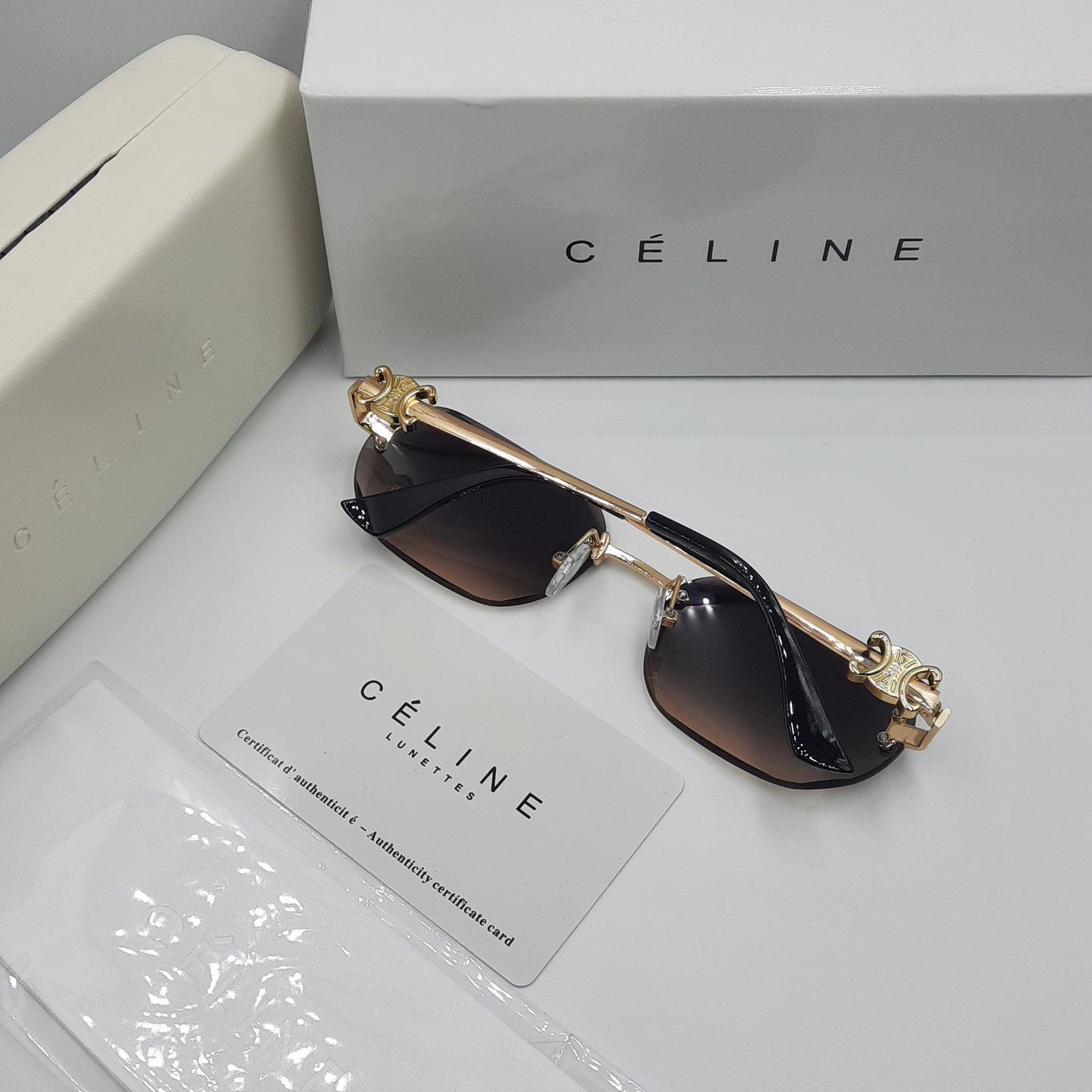CELINE triomphe doré marron