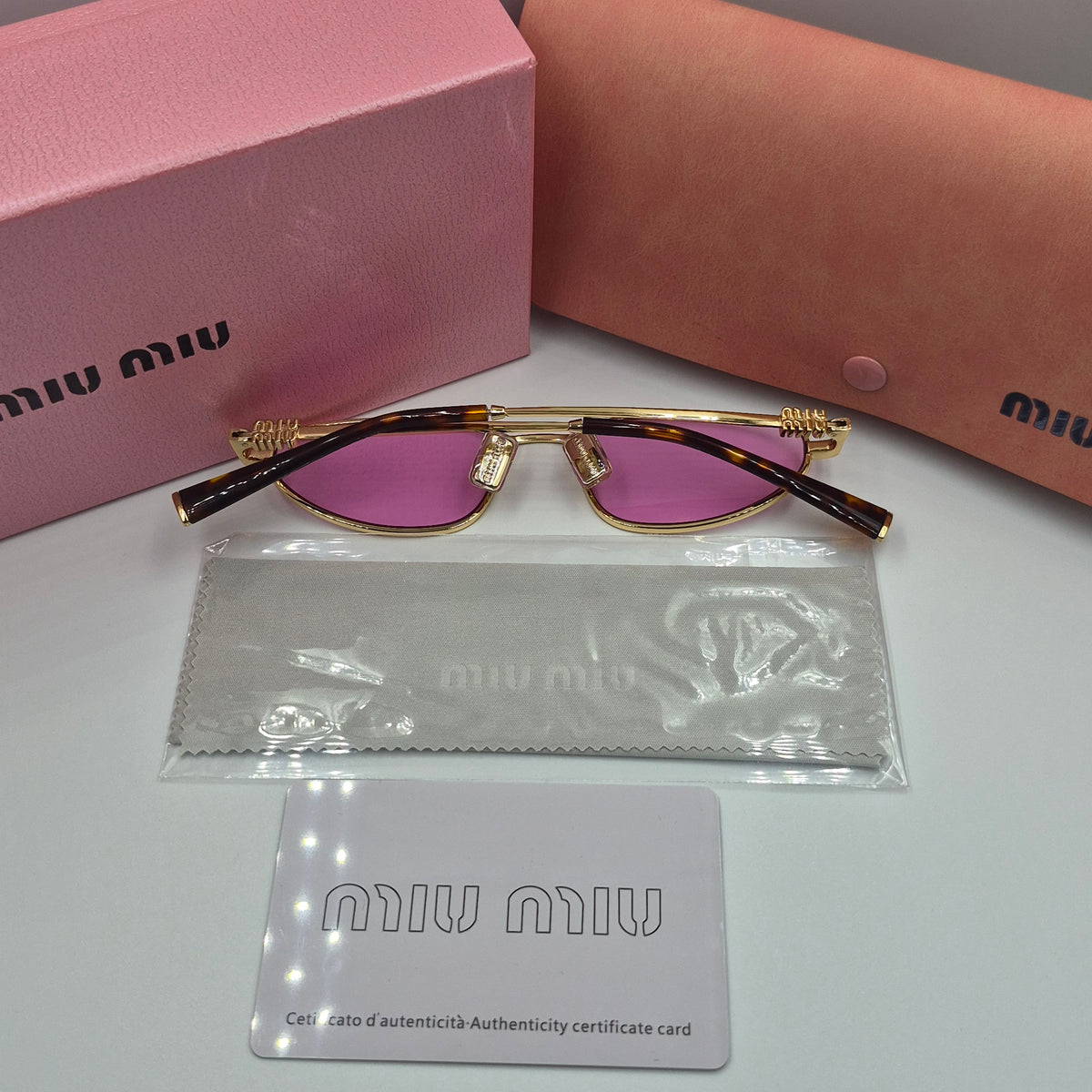 MIU MIU rose gold