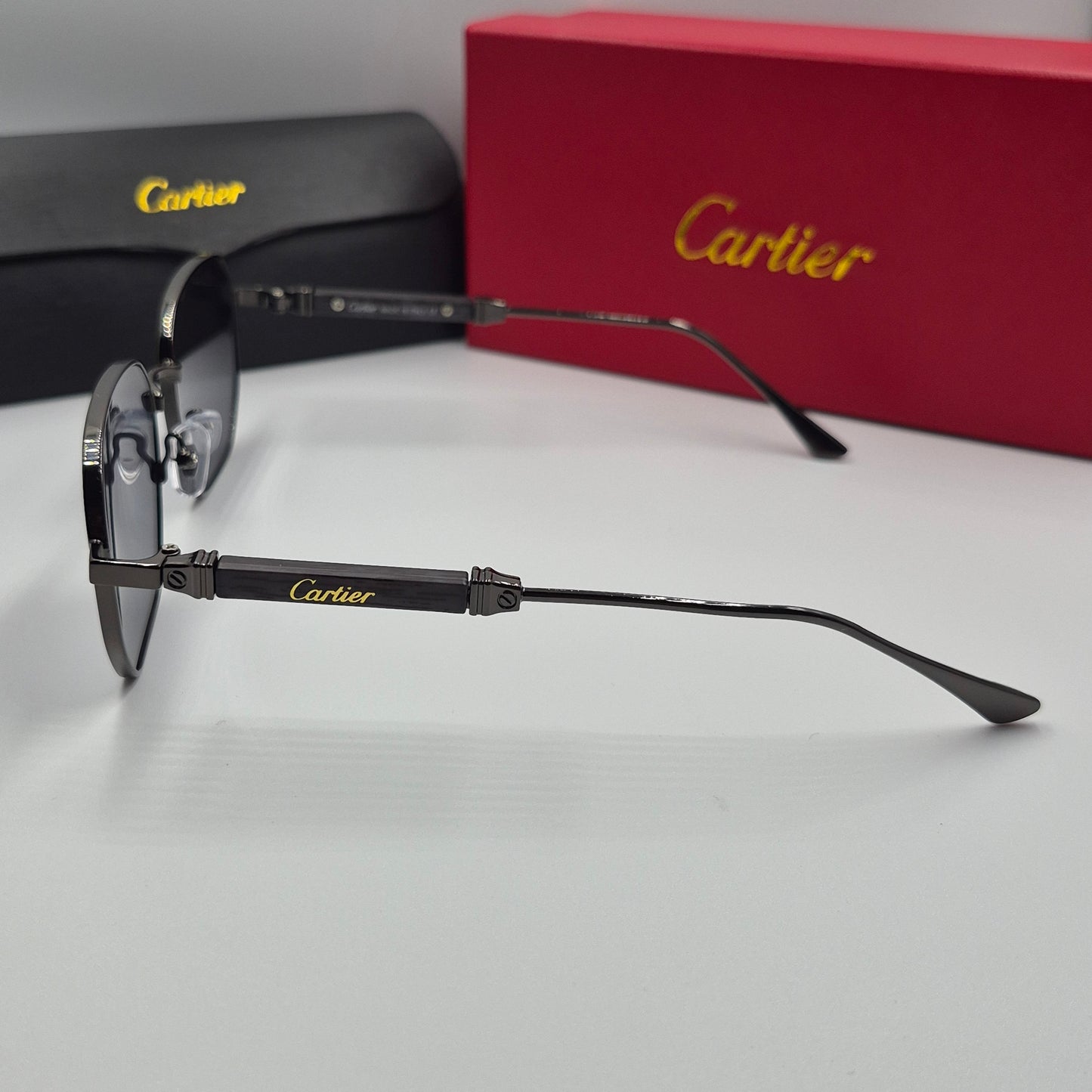 CARTIER luxe metal bois noir