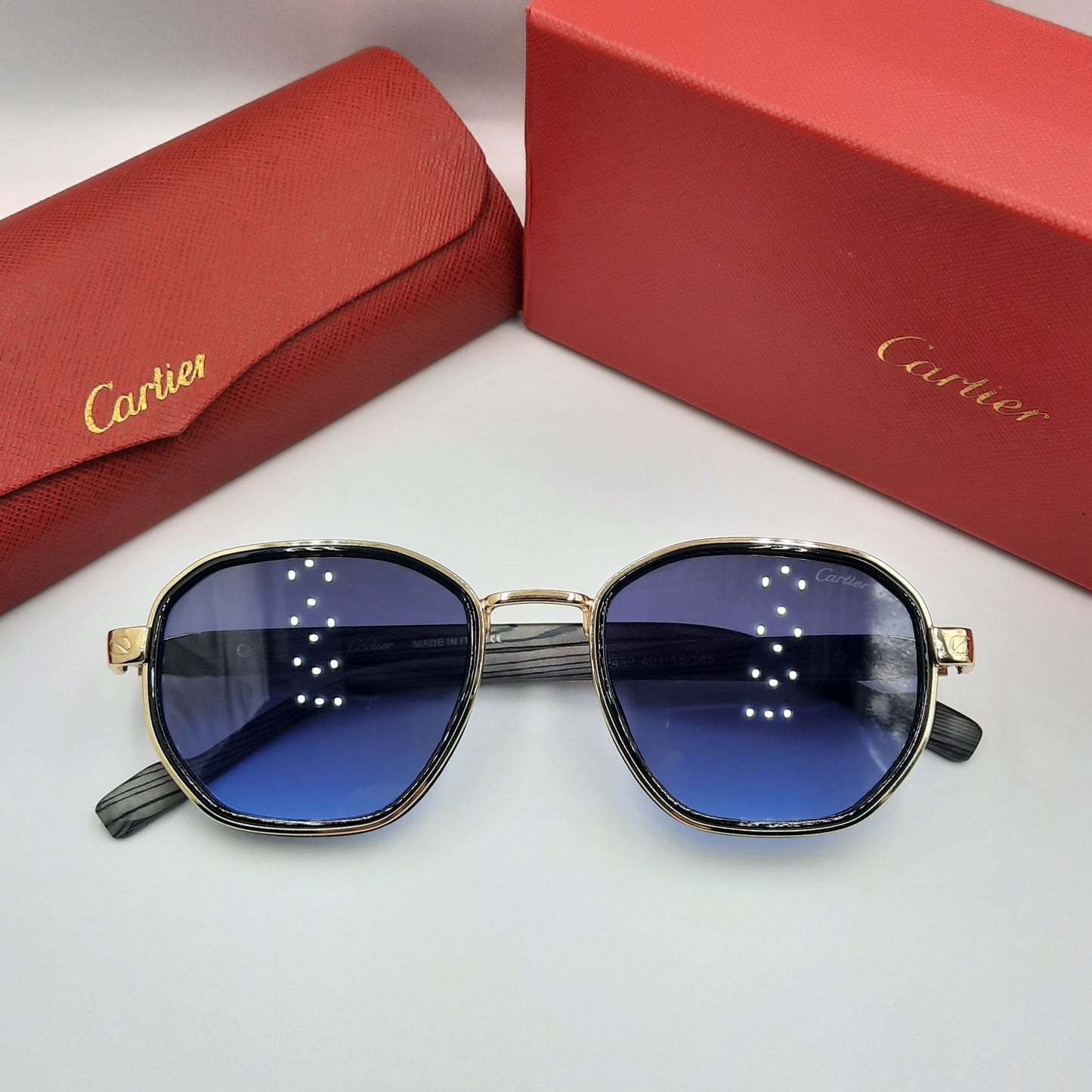 CARTIER luxe doré bleu bois