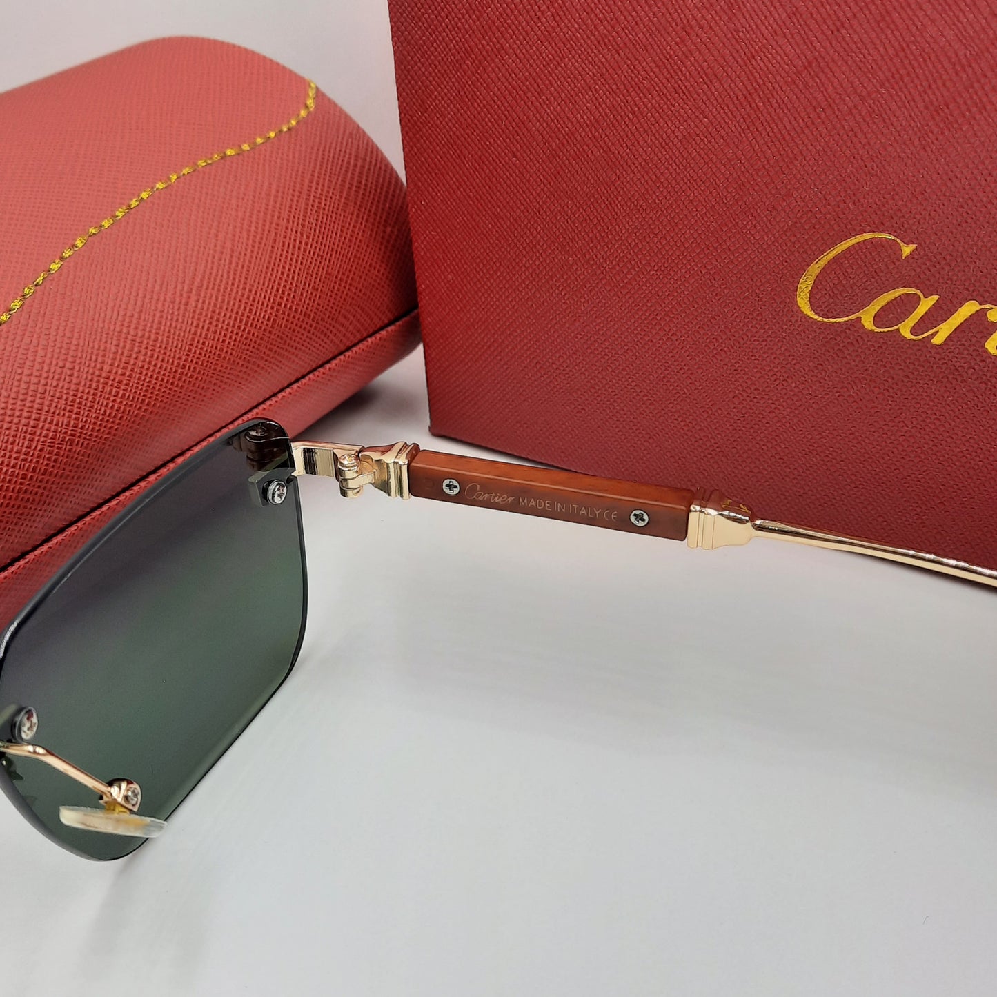 CARTIER rimless doré vert