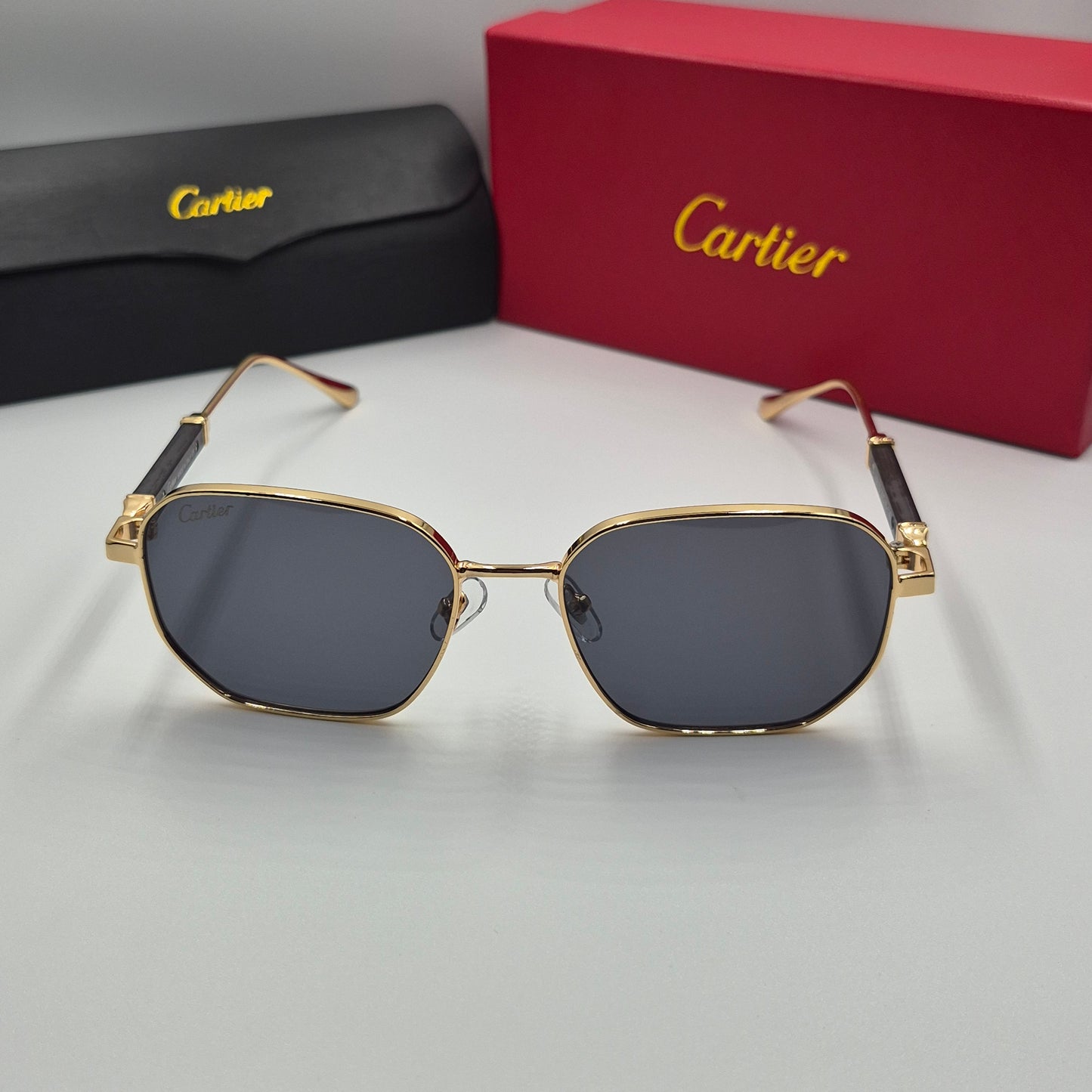 CARTIER luxe metal bois noir doré