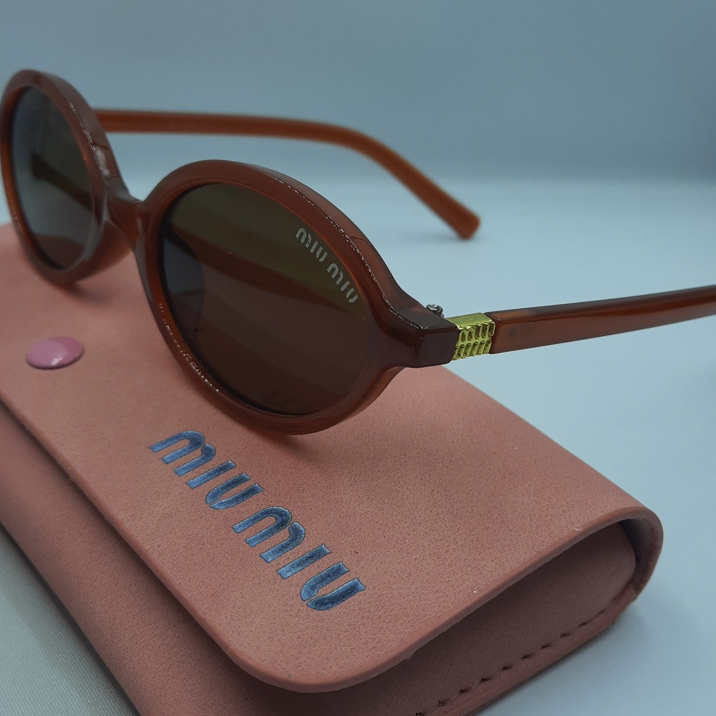 MIU MIU burgundy doré