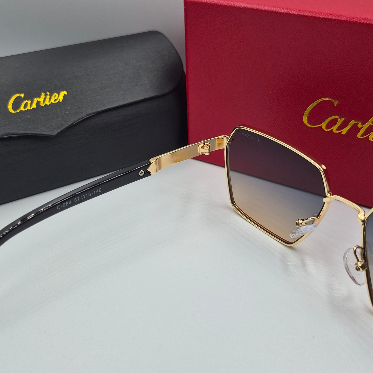 CARTIER noir doré bleu sunrise
