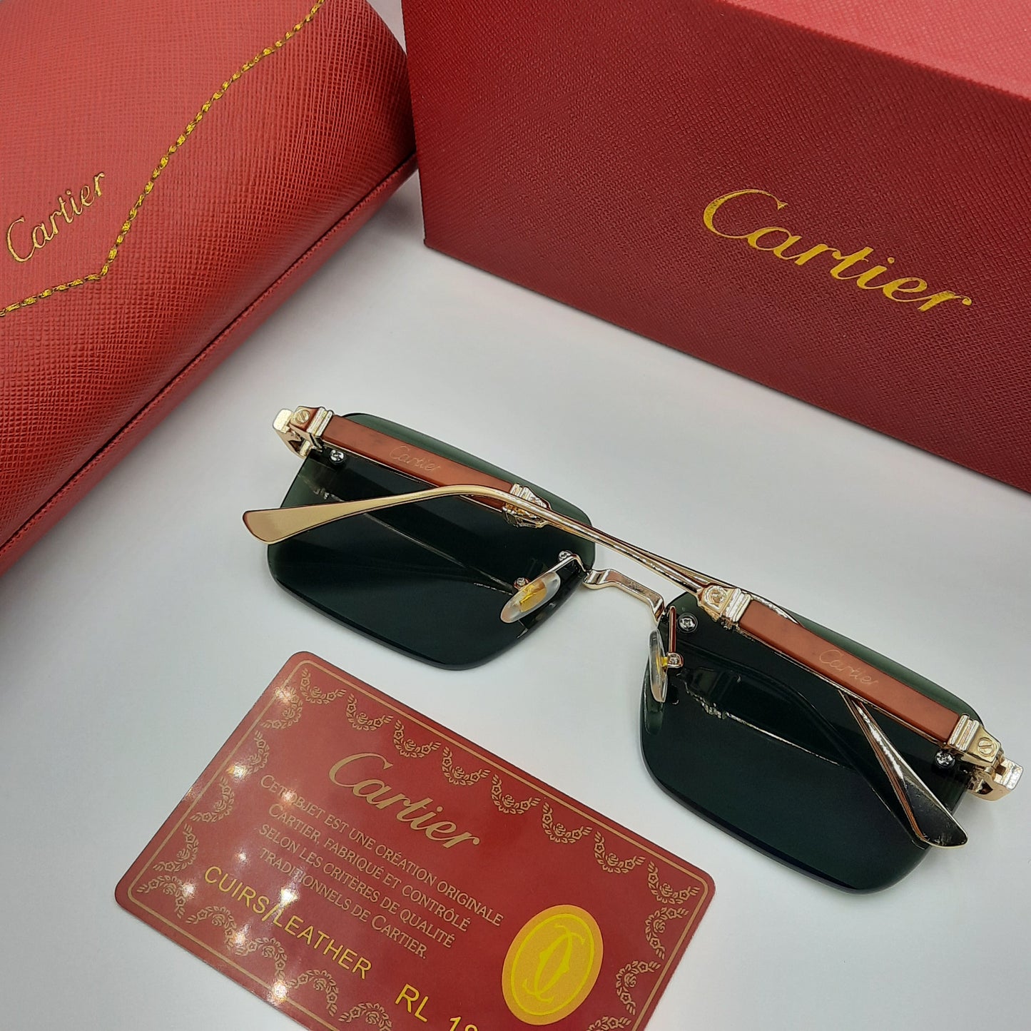 CARTIER rimless doré vert
