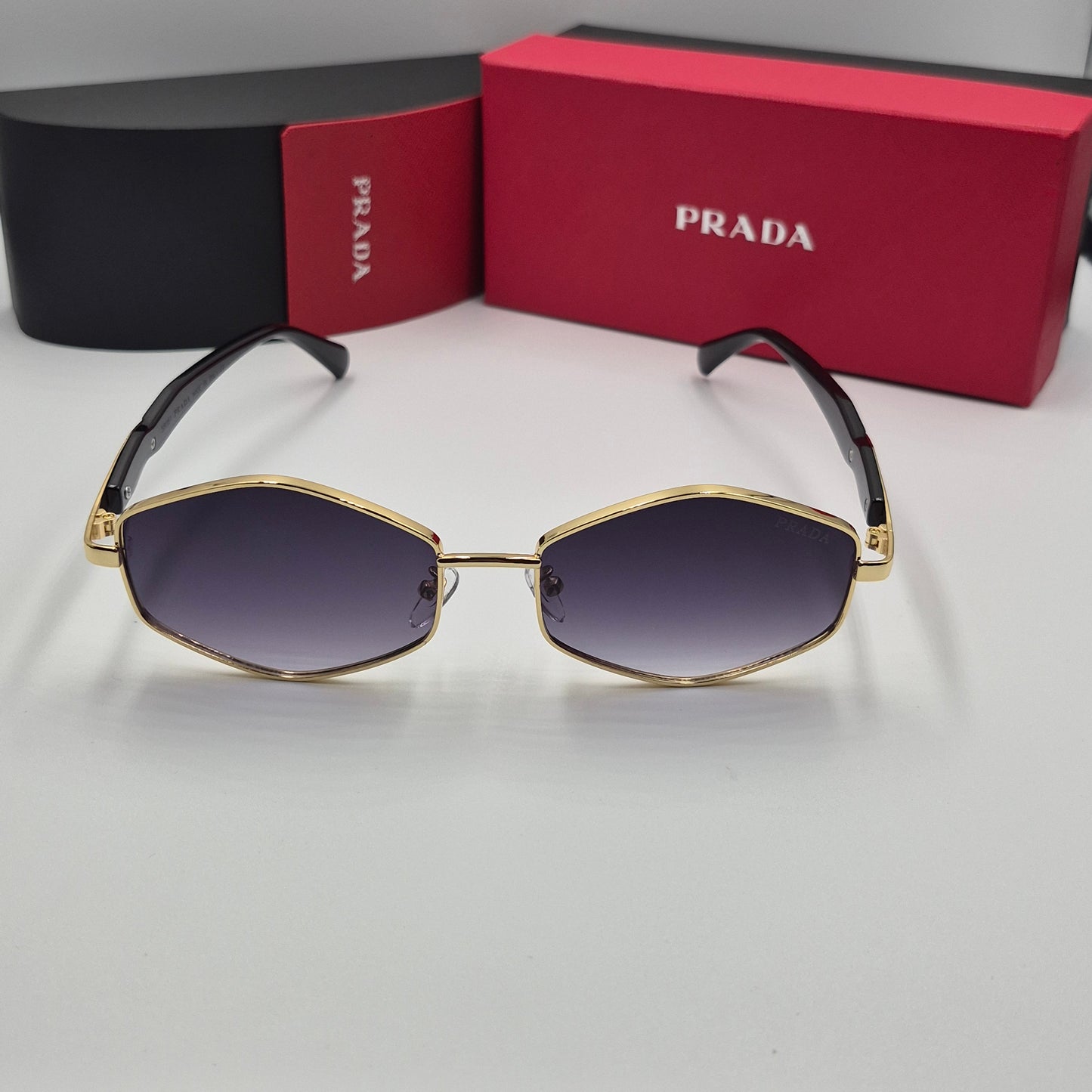PRADA luxe doré noir