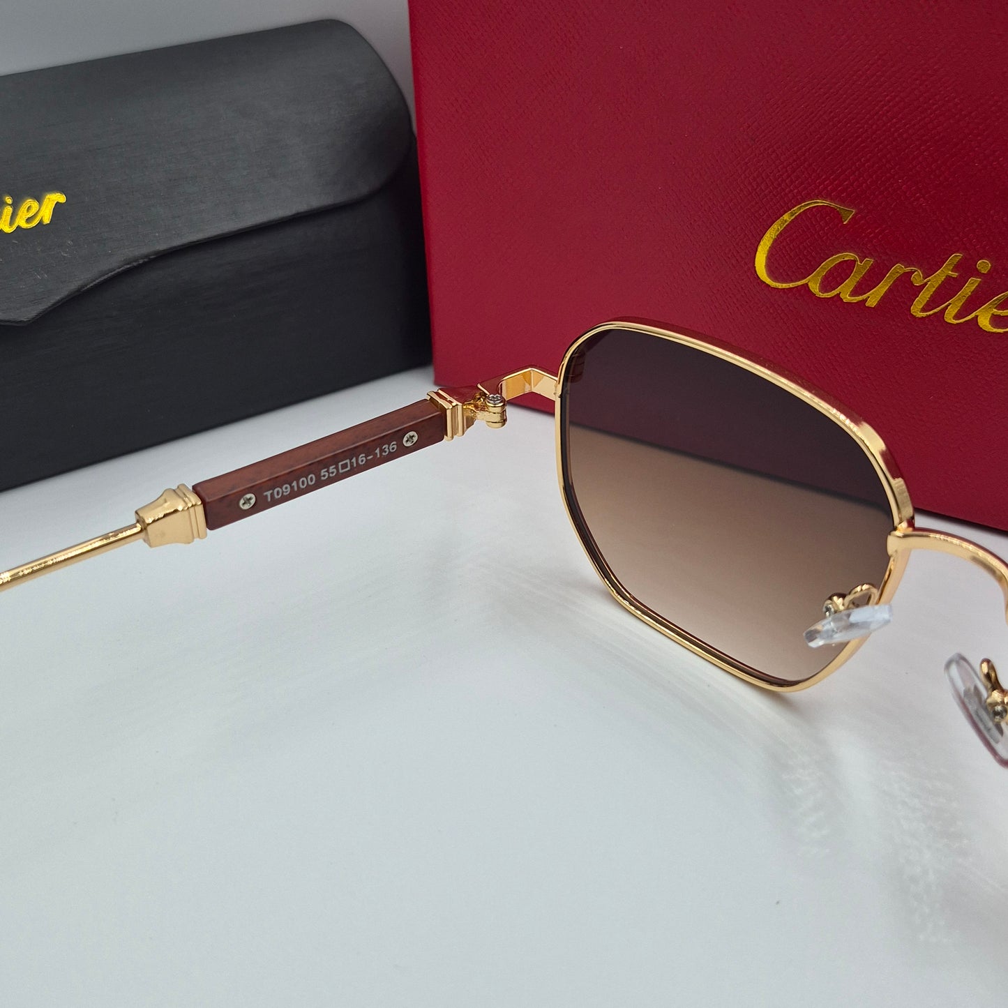 CARTIER luxe metal bois doré marron