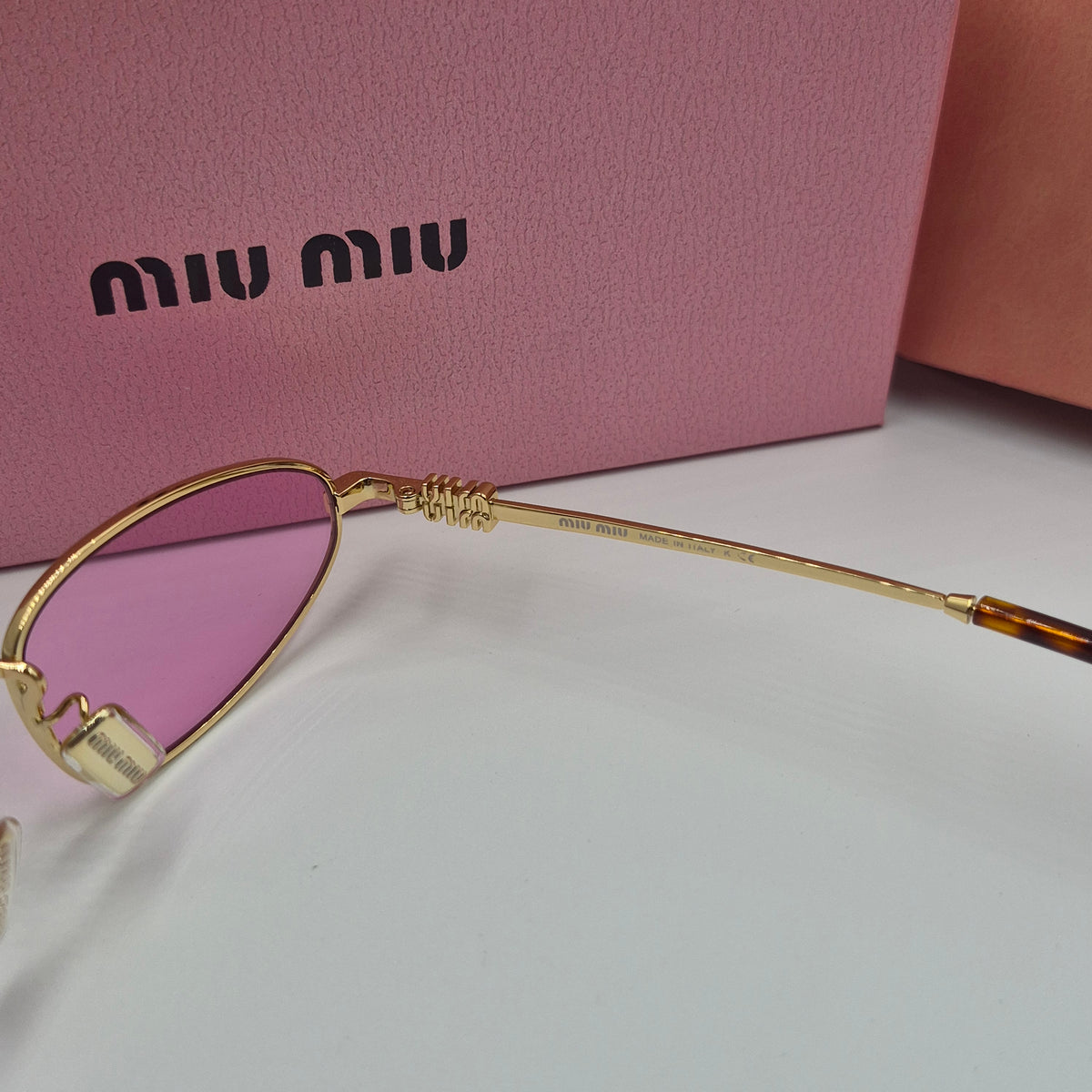 MIU MIU rose gold