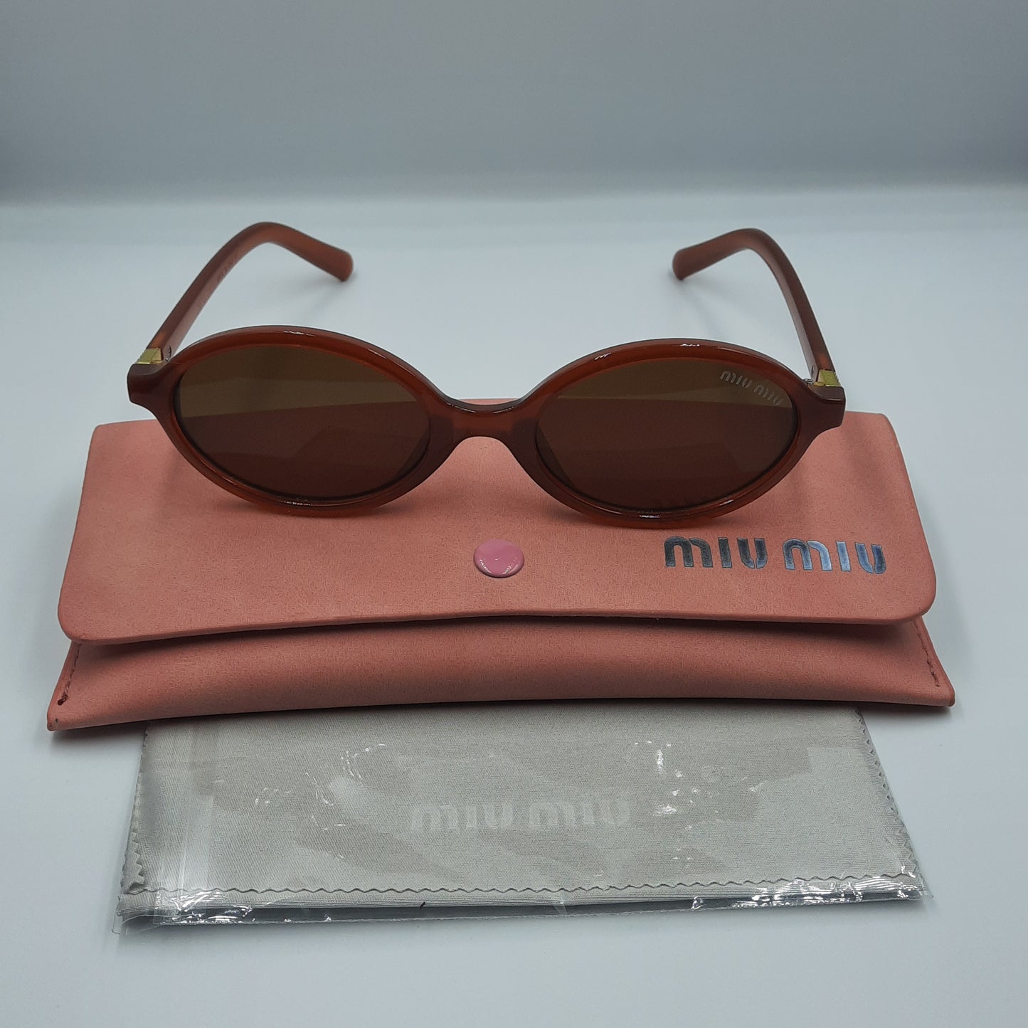 MIU MIU burgundy doré
