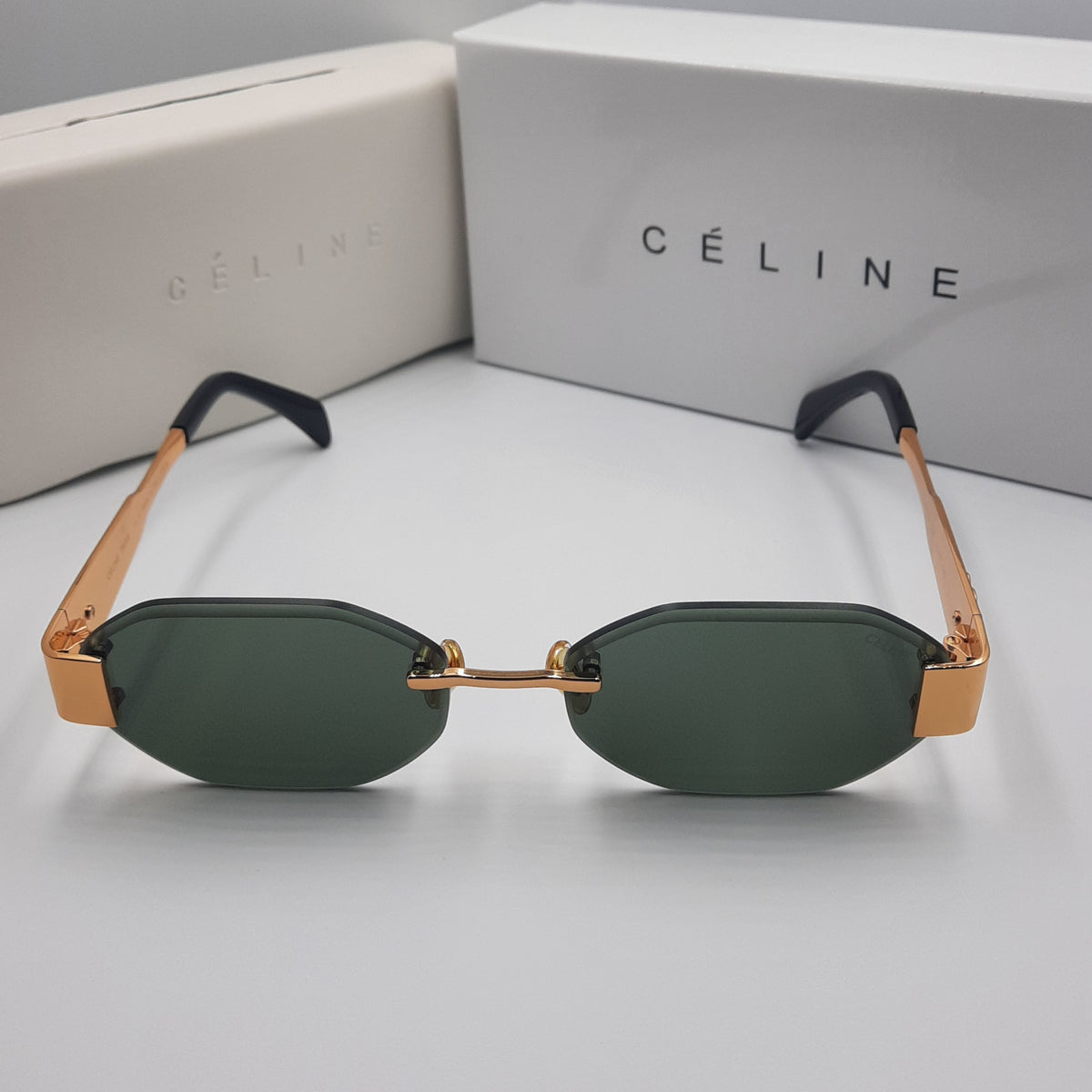 CELINE triomphe doré avec pochette à bandoulière