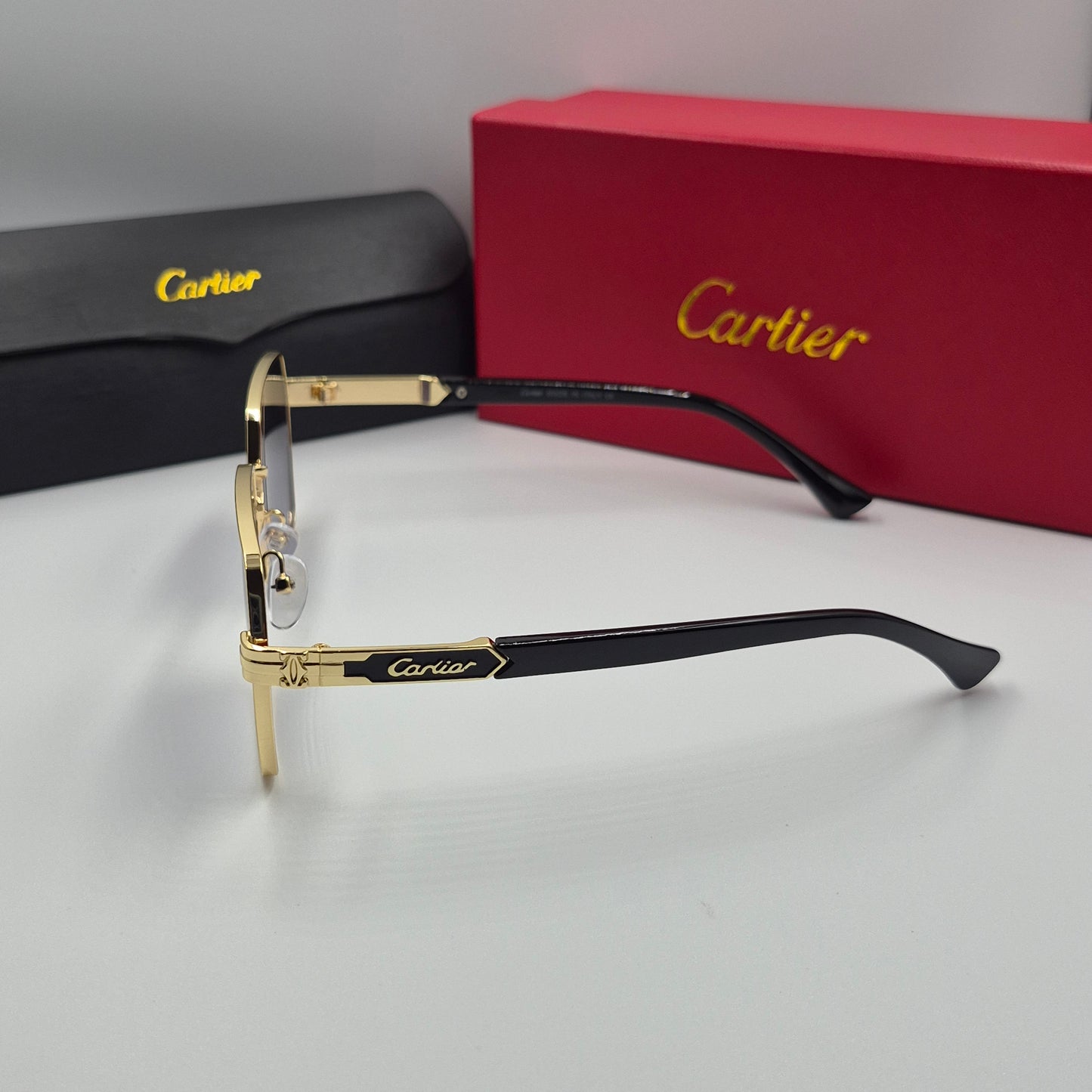 CARTIER noir doré