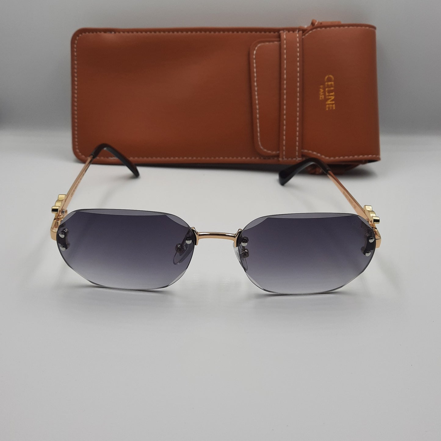 CELINE triomphe noir doré avec pochette à bandoulière