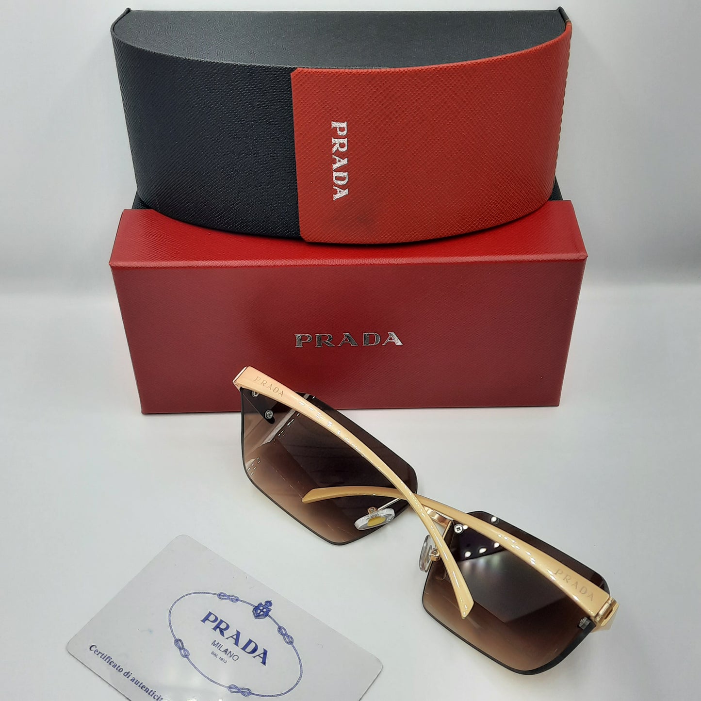 PRADA rimless doré marron