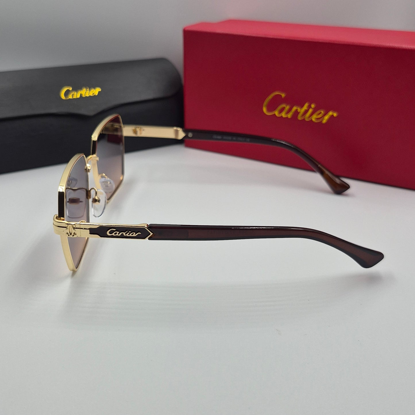 CARTIER noir doré sunset
