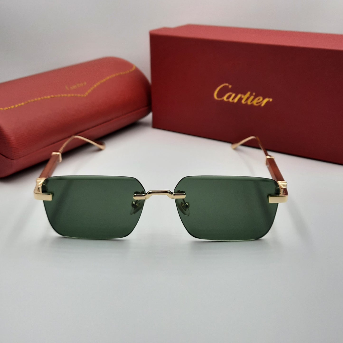 CARTIER rimless doré vert