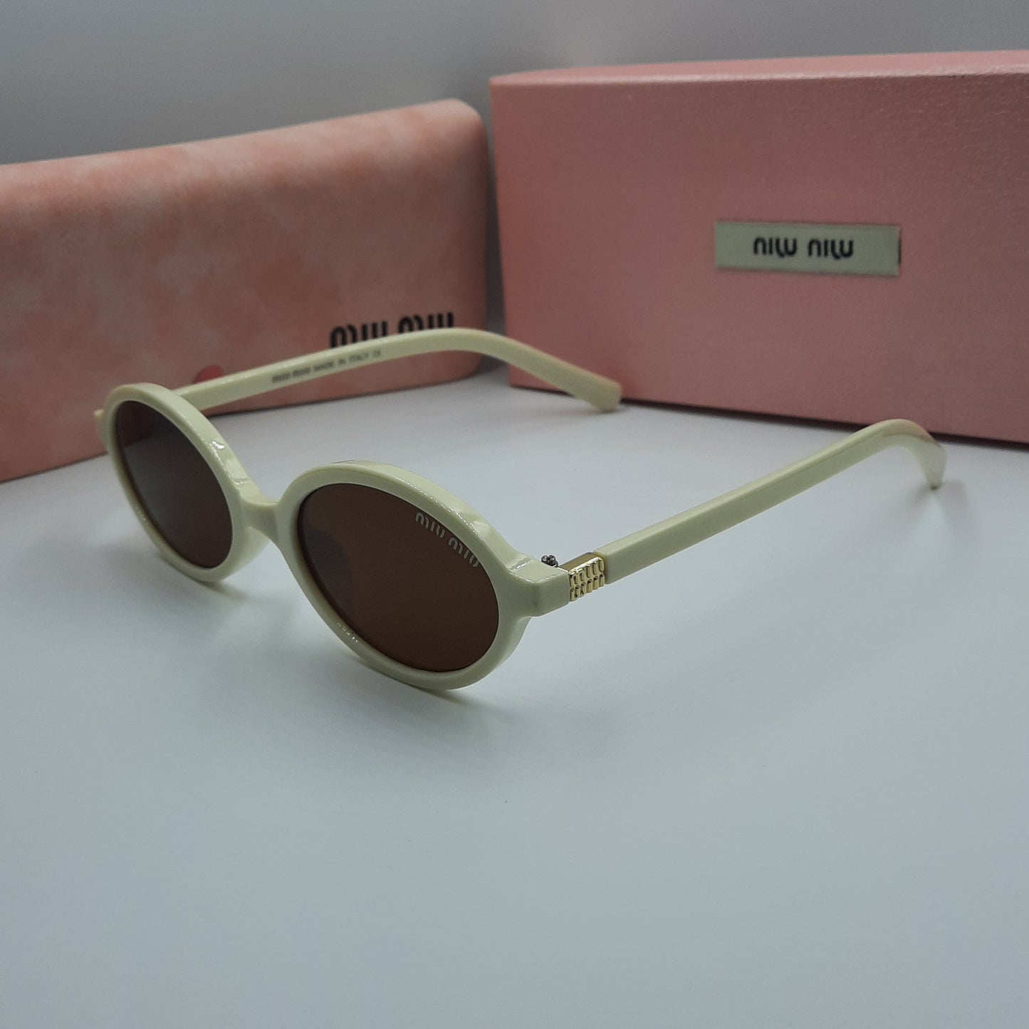 MIU MIU blanc crème doré