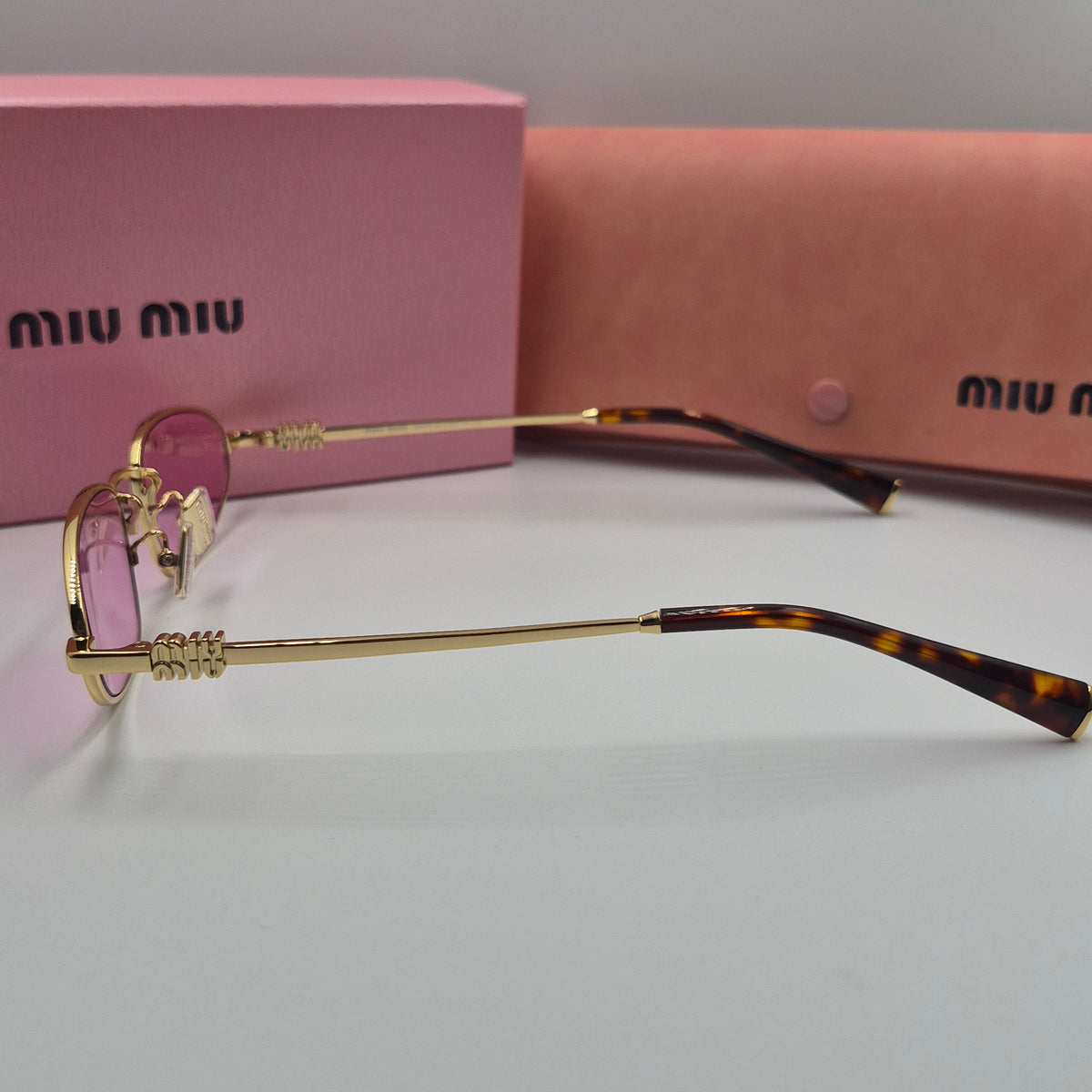 MIU MIU rose gold