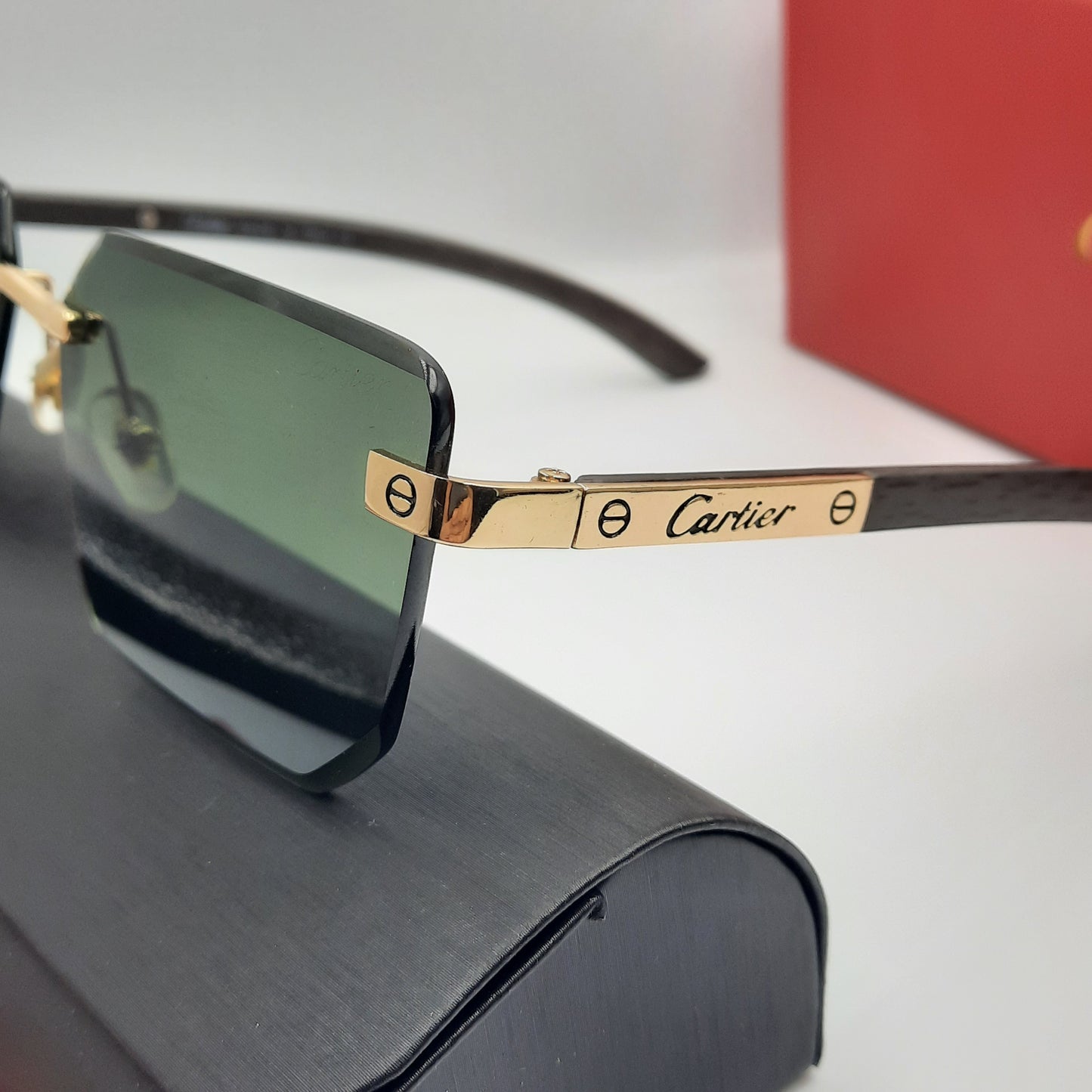 CARTIER rimless doré vert bois