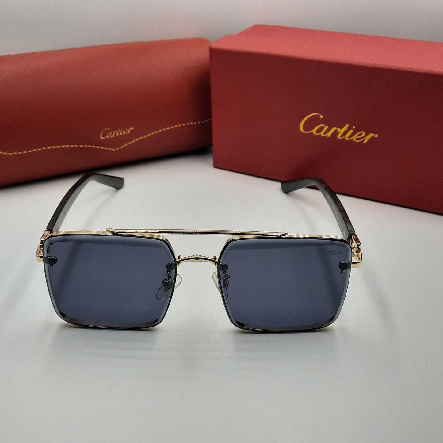 CARTIER noir doré