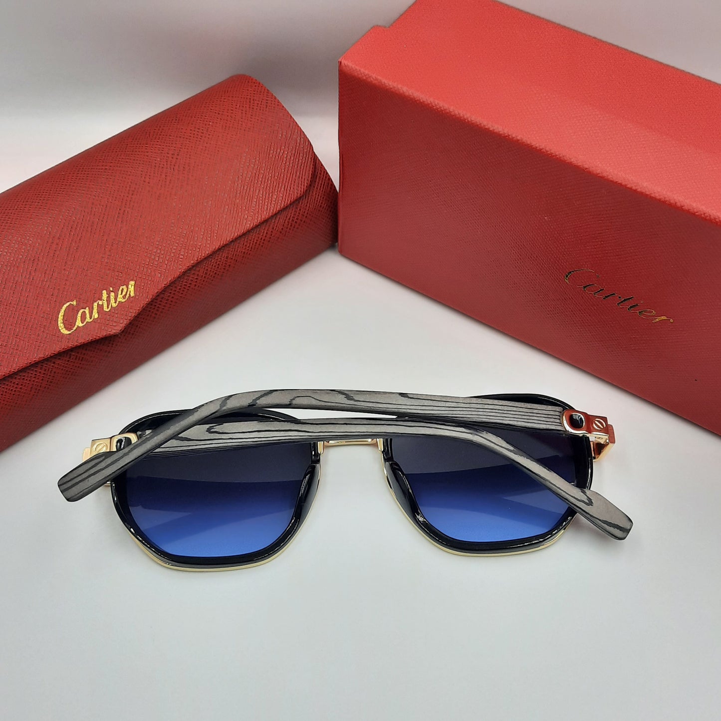 CARTIER luxe doré bleu bois