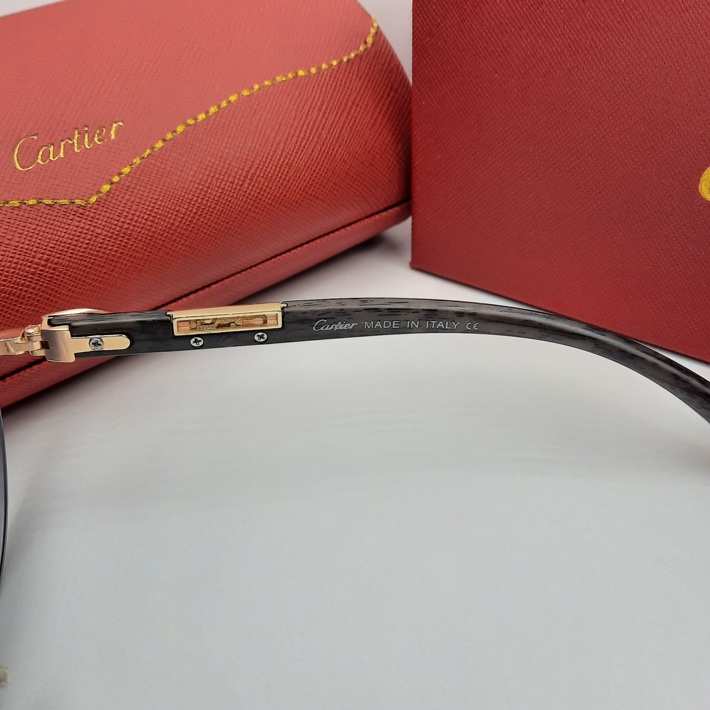 CARTIER percée doré noir wood