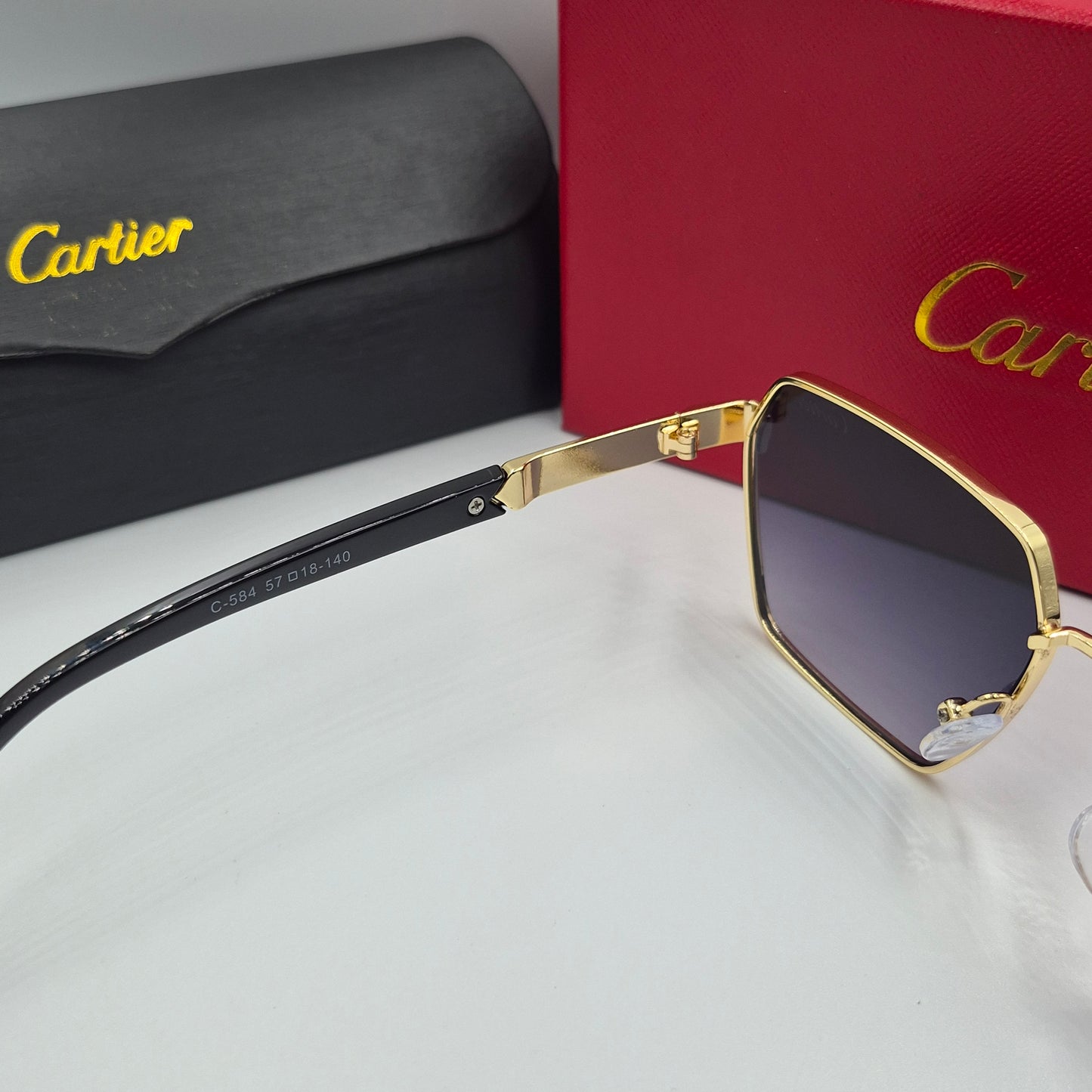 CARTIER noir doré
