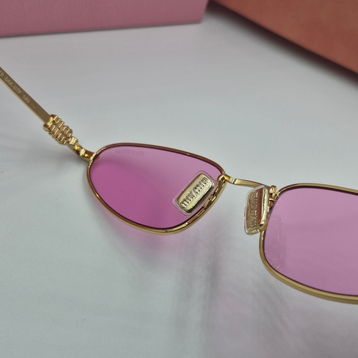 MIU MIU rose gold