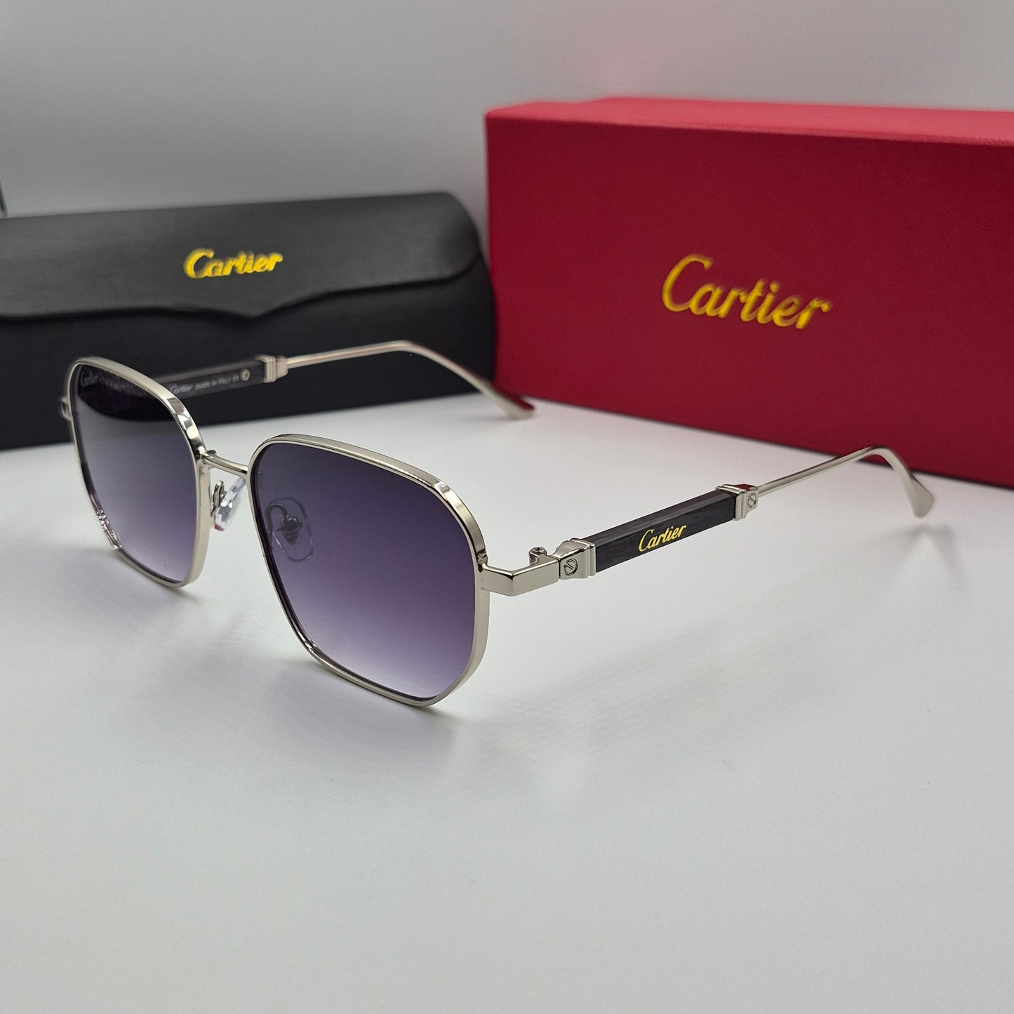 CARTIER luxe metal bois noir argent