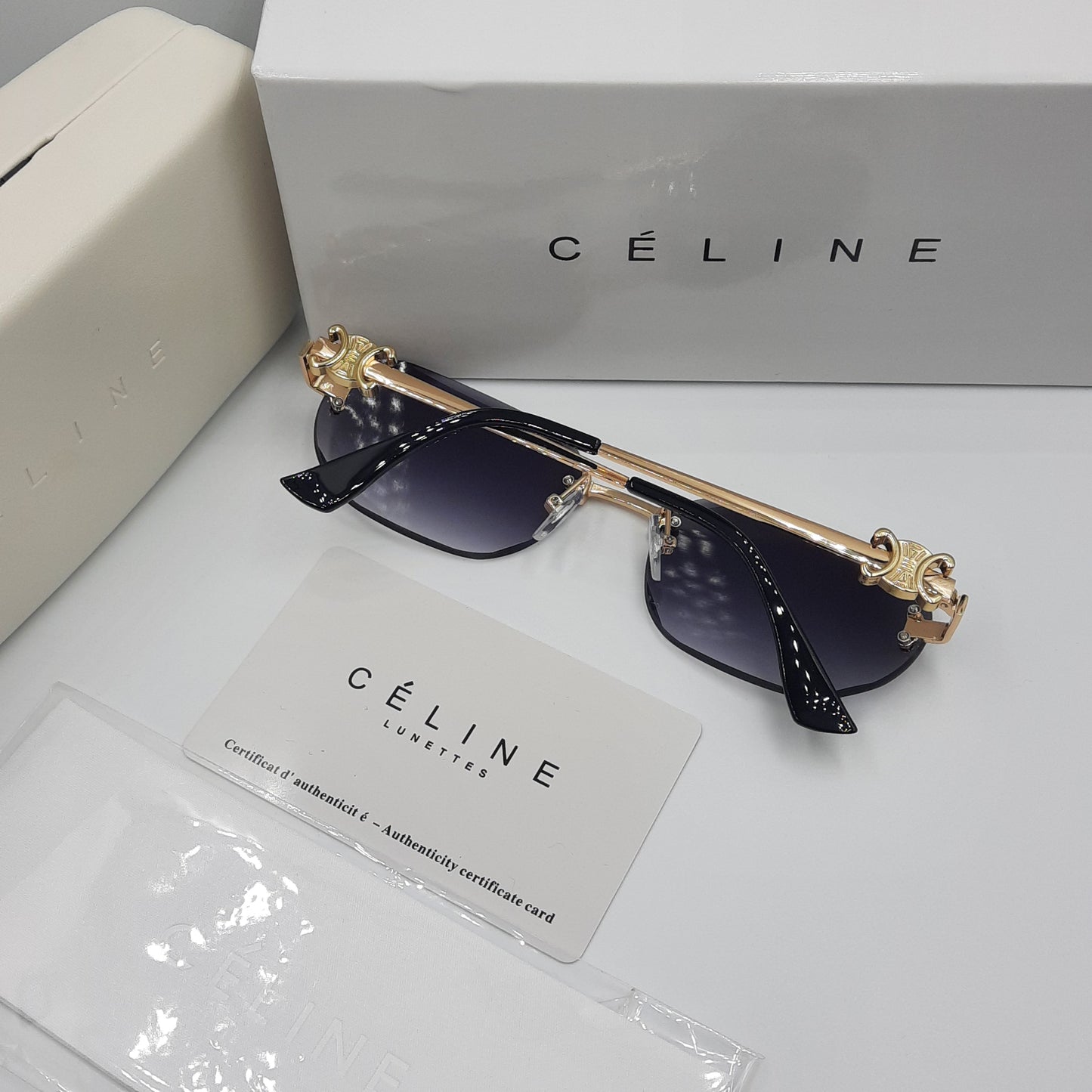 CELINE triomphe noir doré