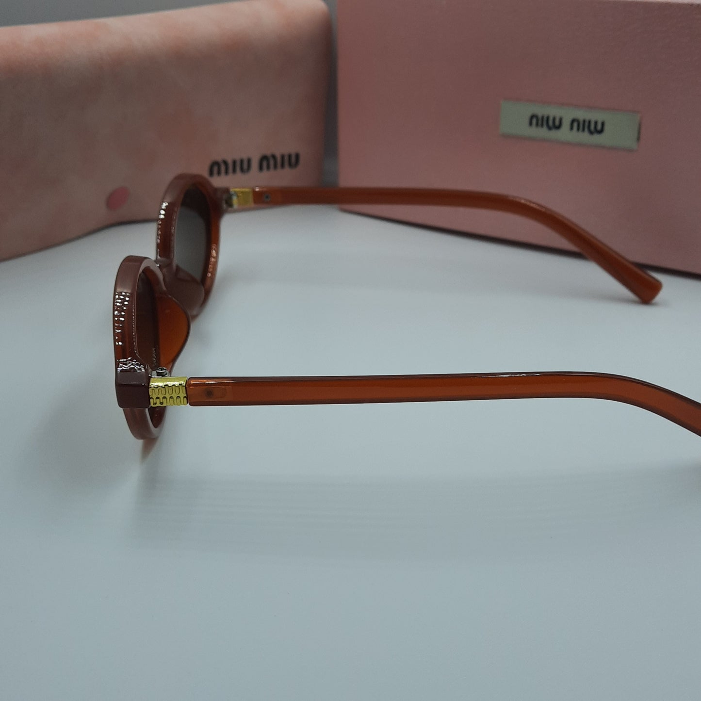MIU MIU burgundy doré