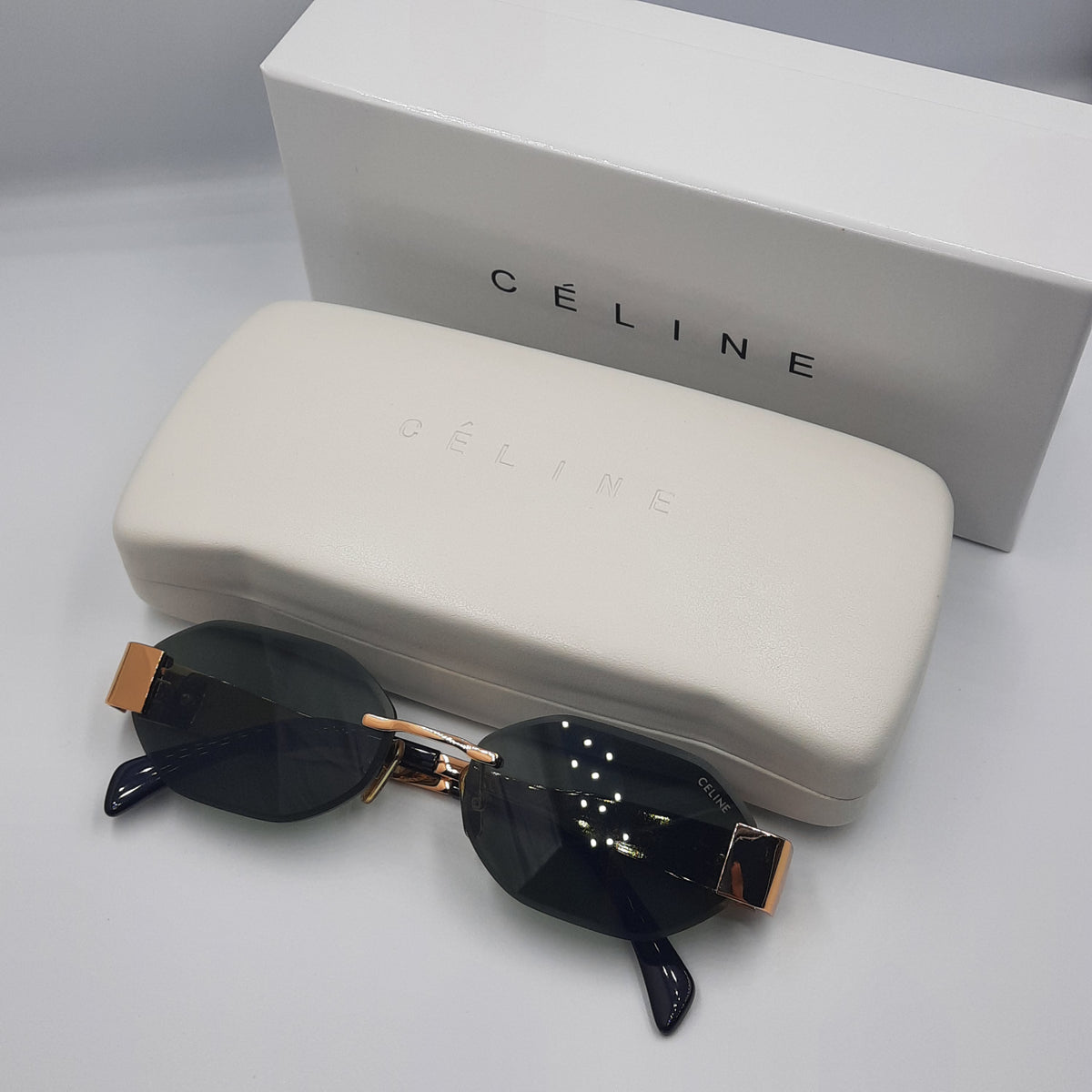 CELINE triomphe doré avec pochette à bandoulière