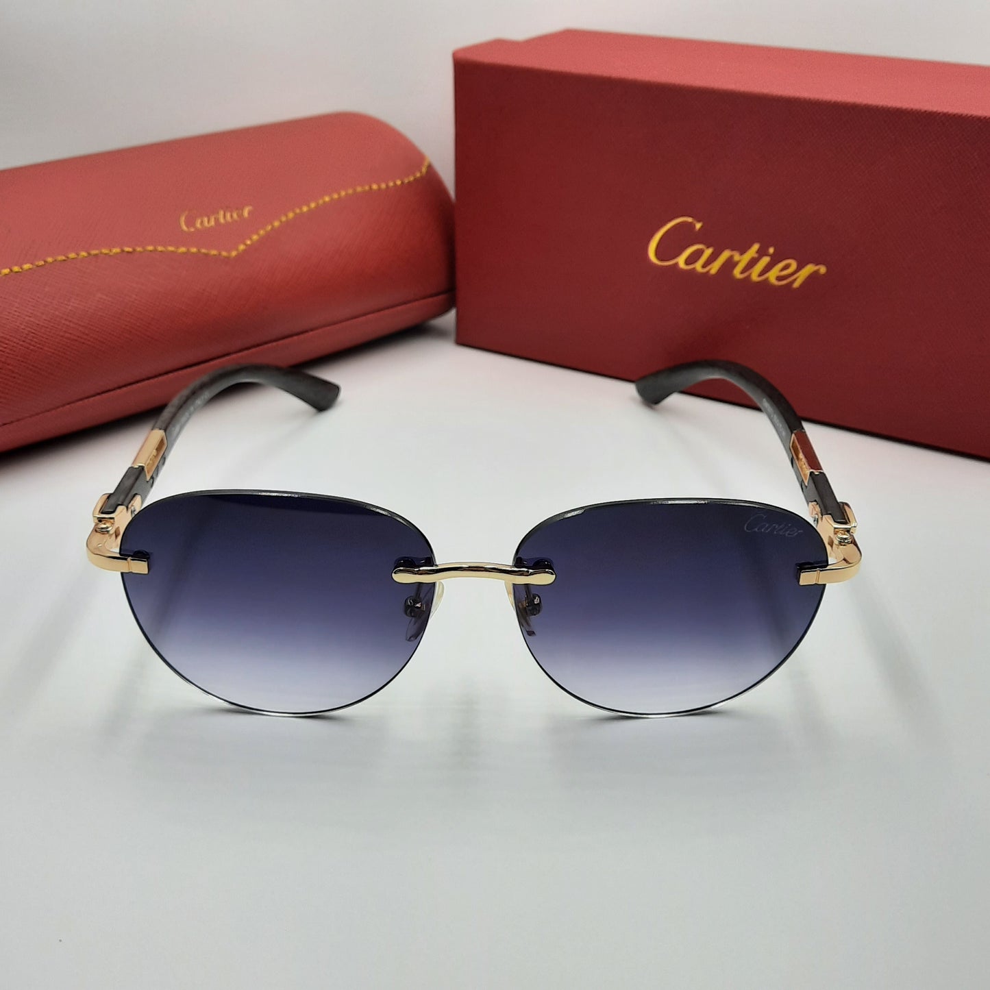 CARTIER percée doré noir wood