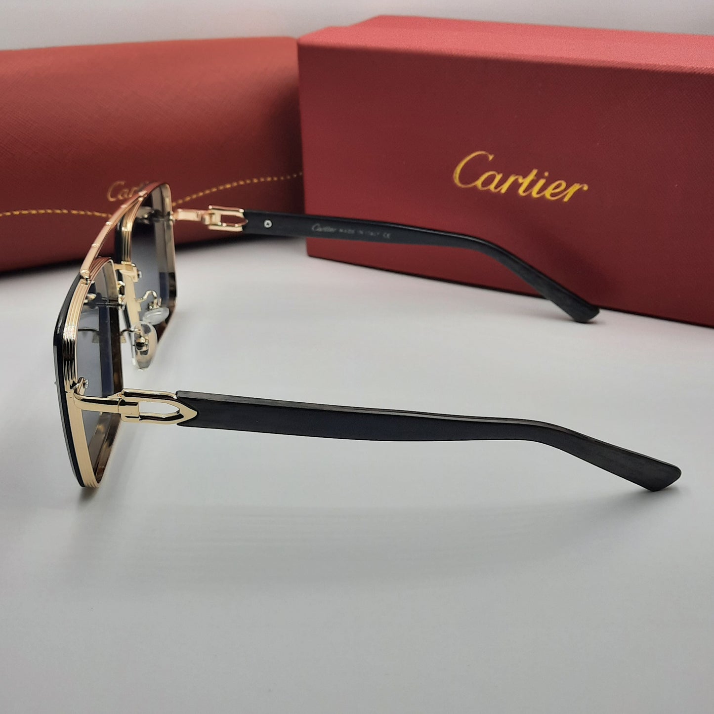 CARTIER noir doré