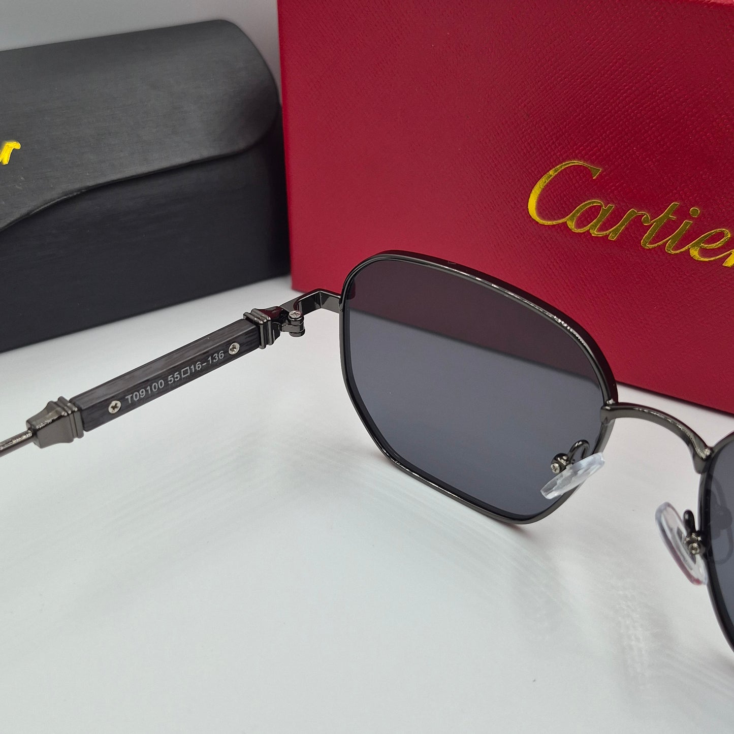 CARTIER luxe metal bois noir
